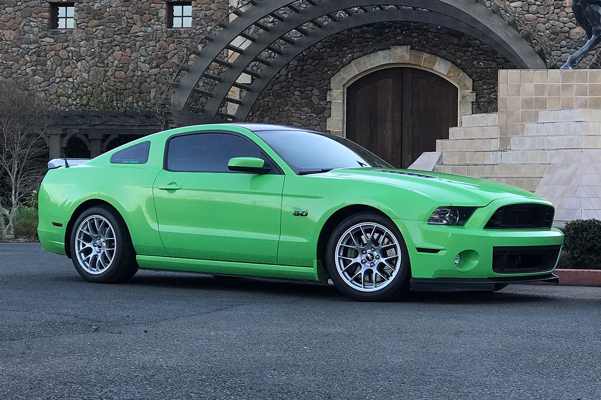Green Ford S197 Mustang GT with 18" EC-7 Apex wheels in Race Silver