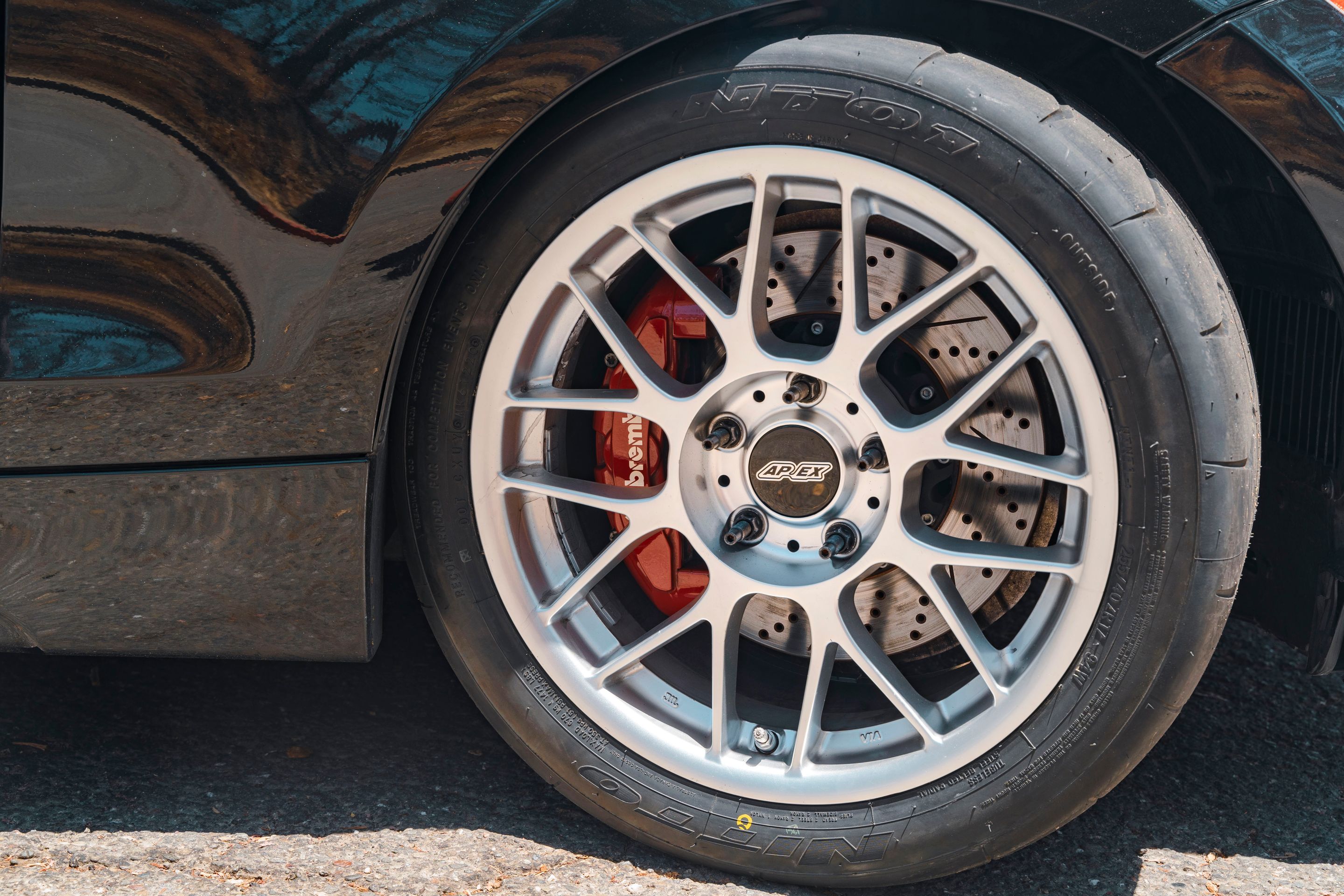 Black BMW E82 Coupe 1 Series with 17" ARC-8 Apex wheels in Race Silver