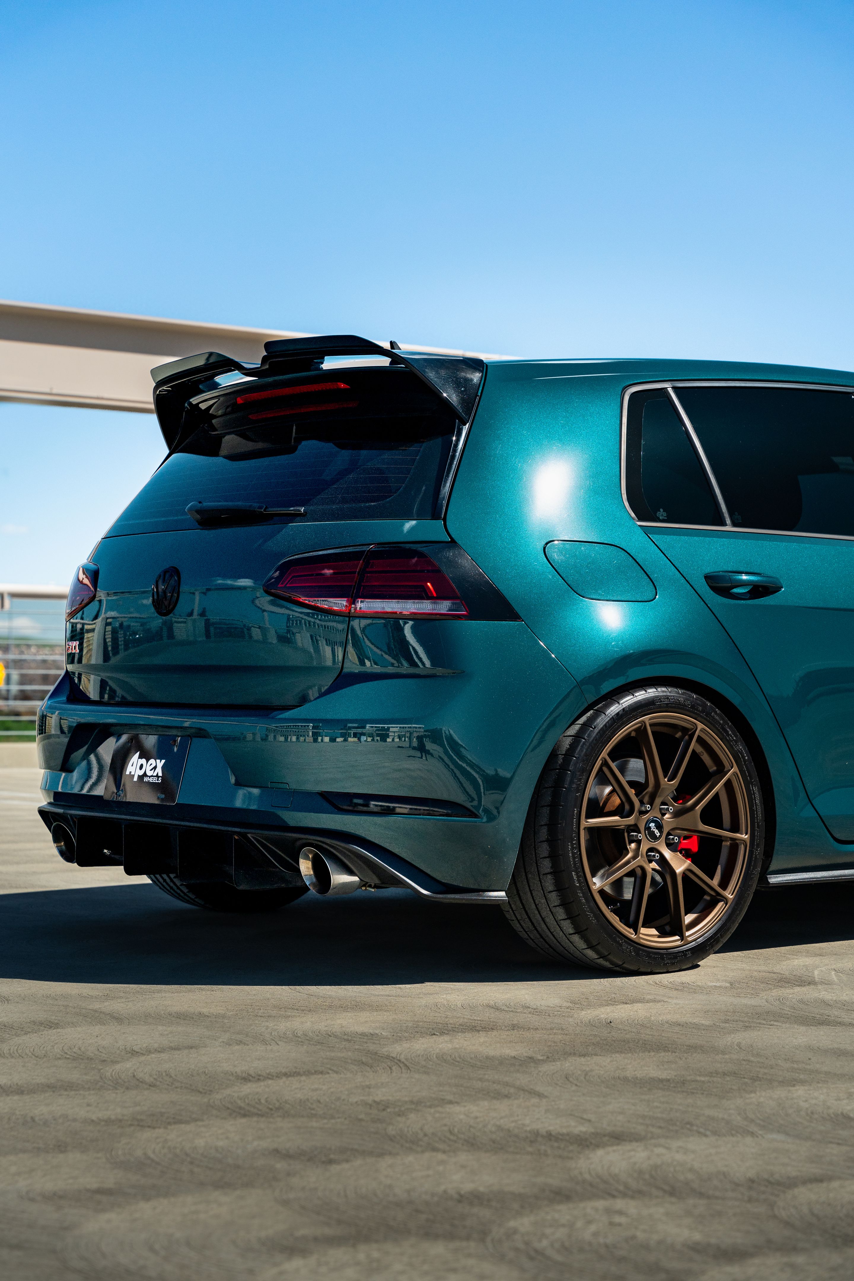 Green VW MK7 GTI with 18" VS-5 Apex wheels in Satin Bronze