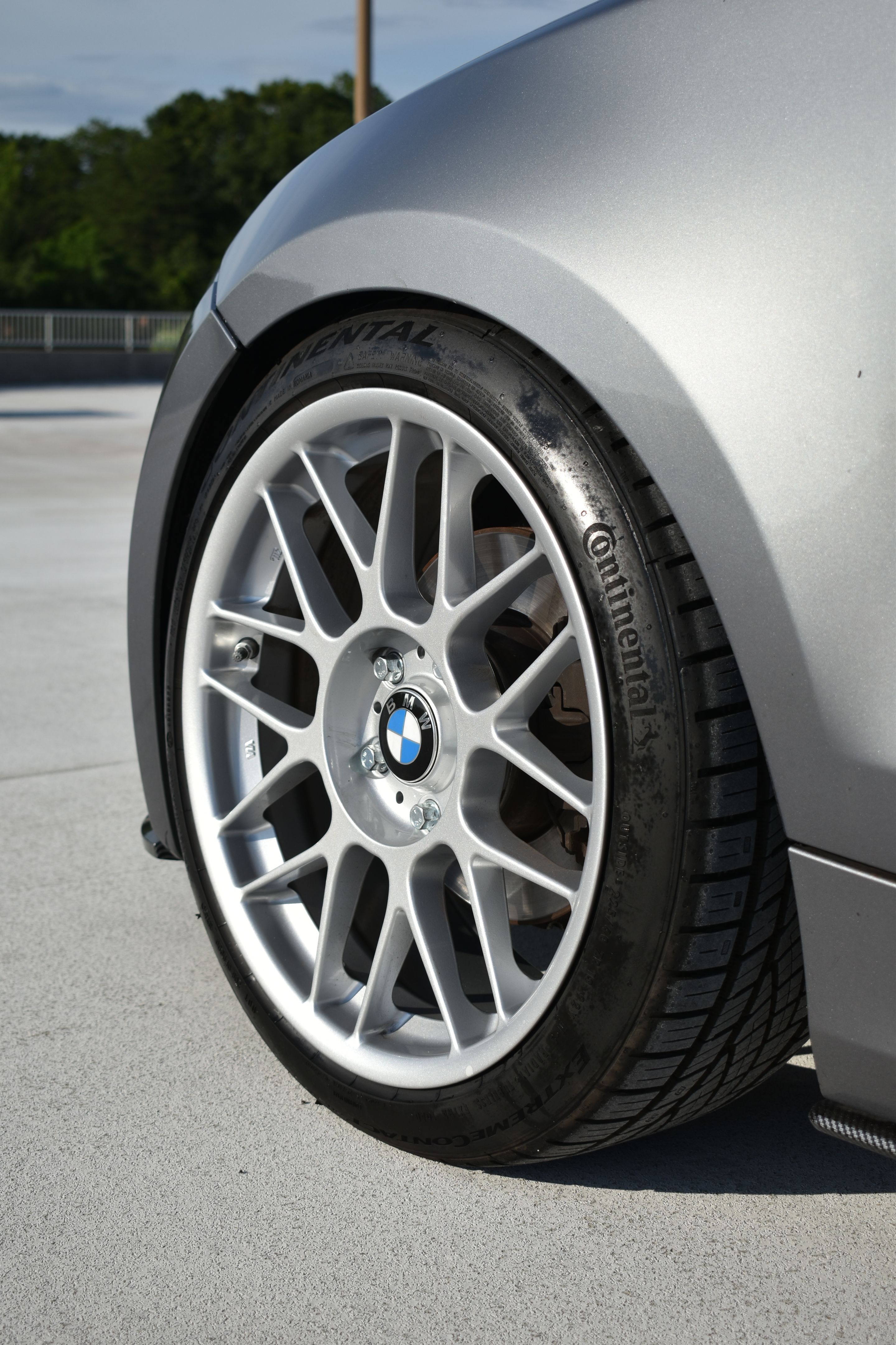 Silver BMW E82 Coupe 1 Series with 18" ARC-8 Apex wheels in Race Silver