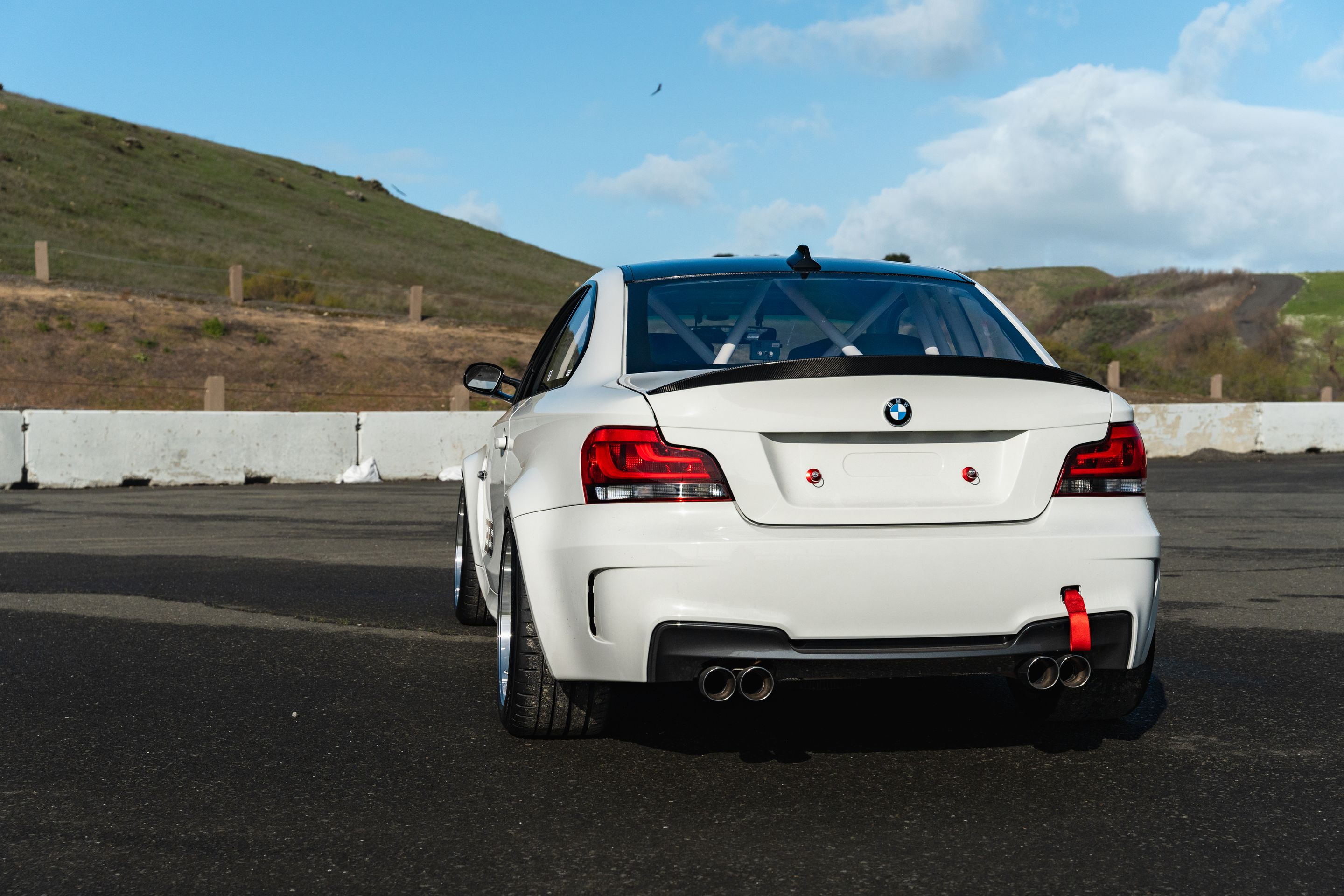White BMW E82 1M with 18" ML-10RT Apex wheels in Machined Lip Gloss Motorsport Gold
