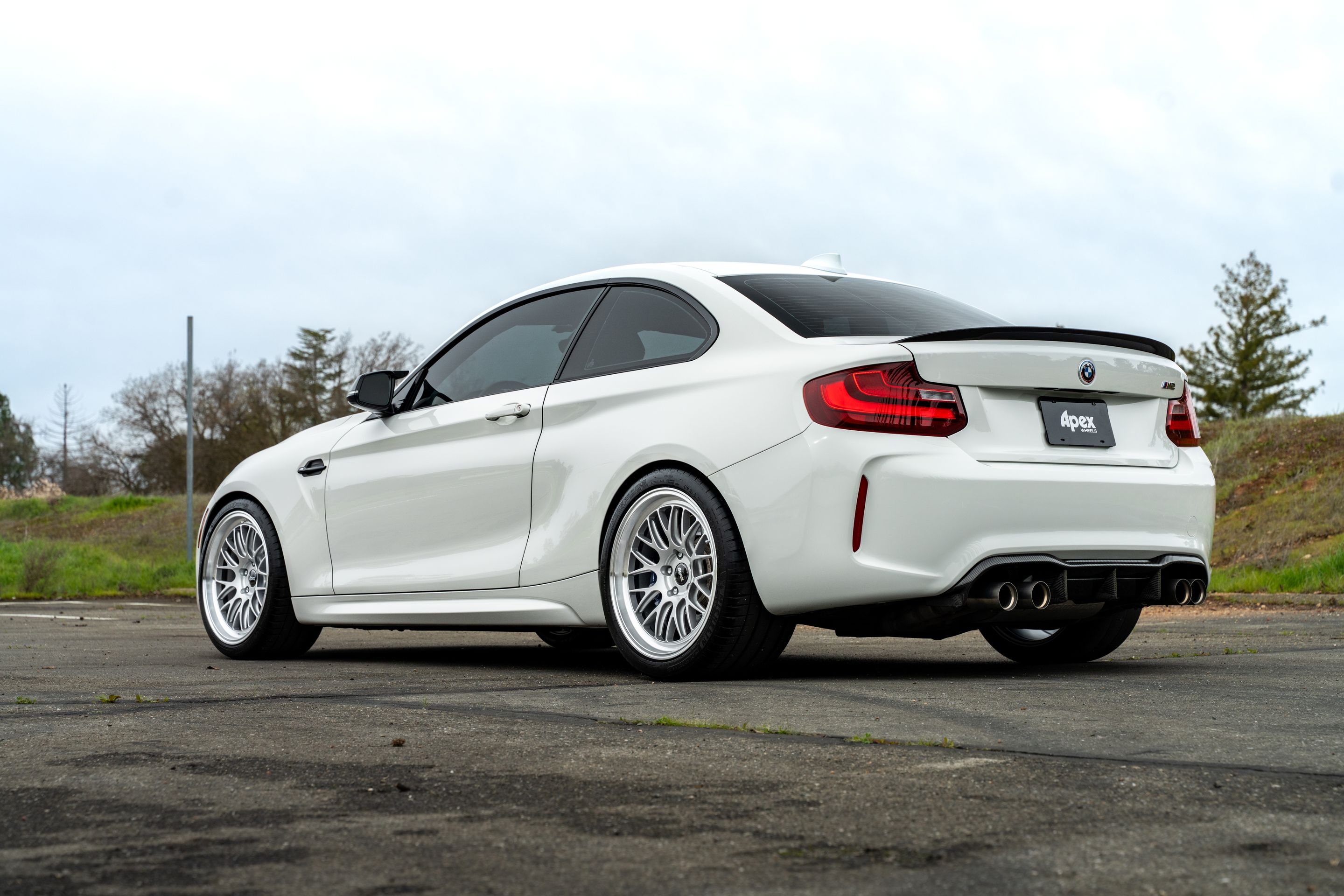 White BMW F87 M2 with 19" ML-10RT Apex wheels in Machined Lip Race Silver