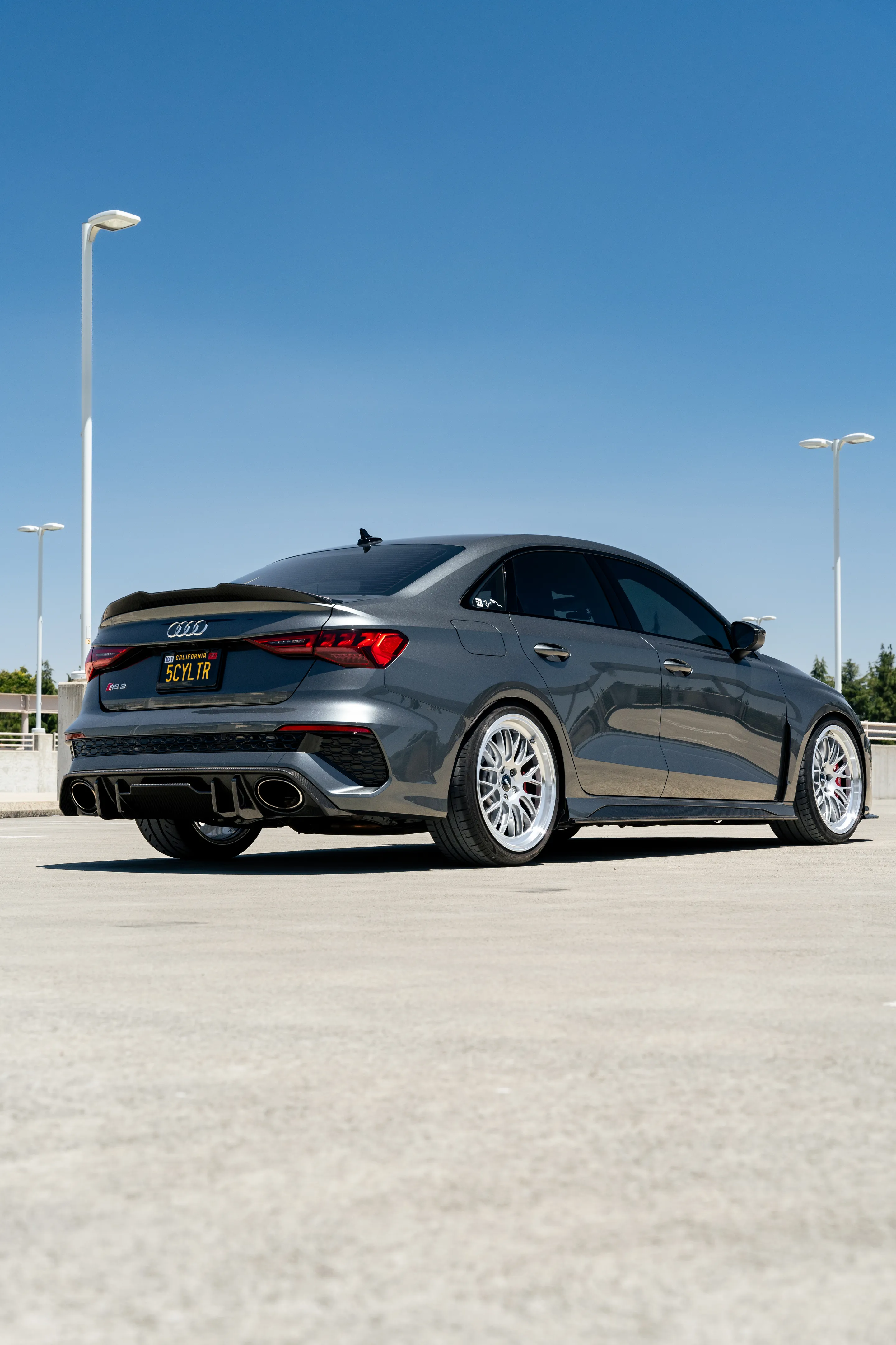 Grey Audi 8Y RS 3 with 19" ML-10RT Apex wheels in Machined Lip Race Silver