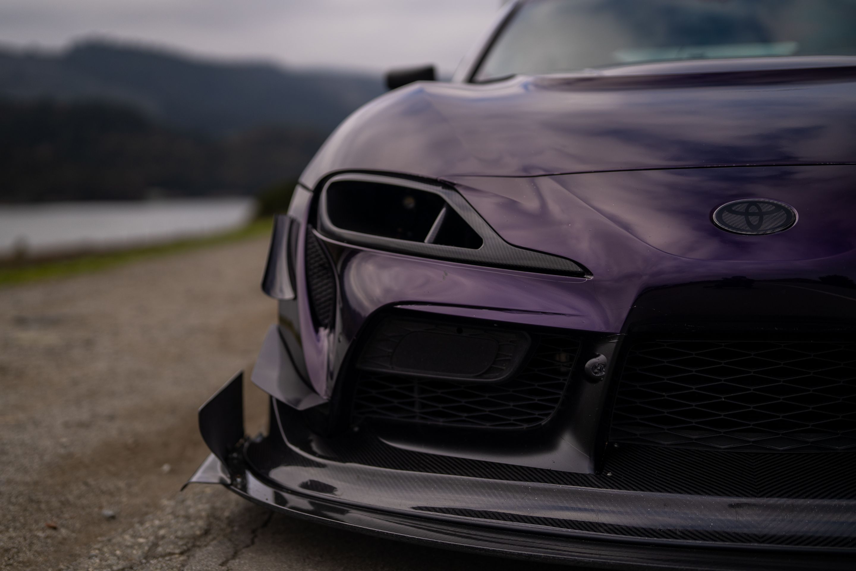Purple Toyota GR Supra with 18" EC-7RS Apex wheels in Anthracite