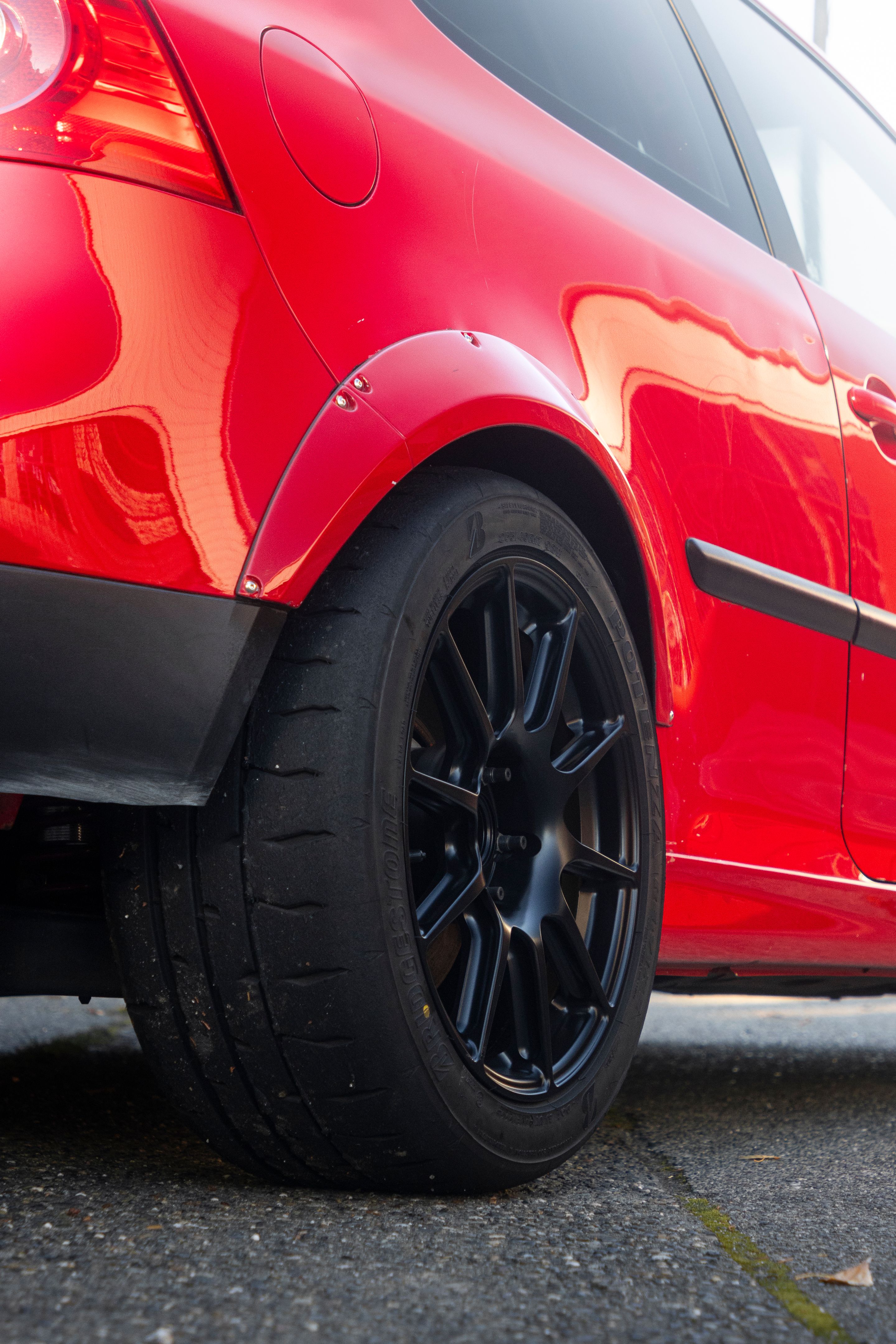 Red VW MK5 Golf with 17" SM-10 Apex wheels in Satin Black
