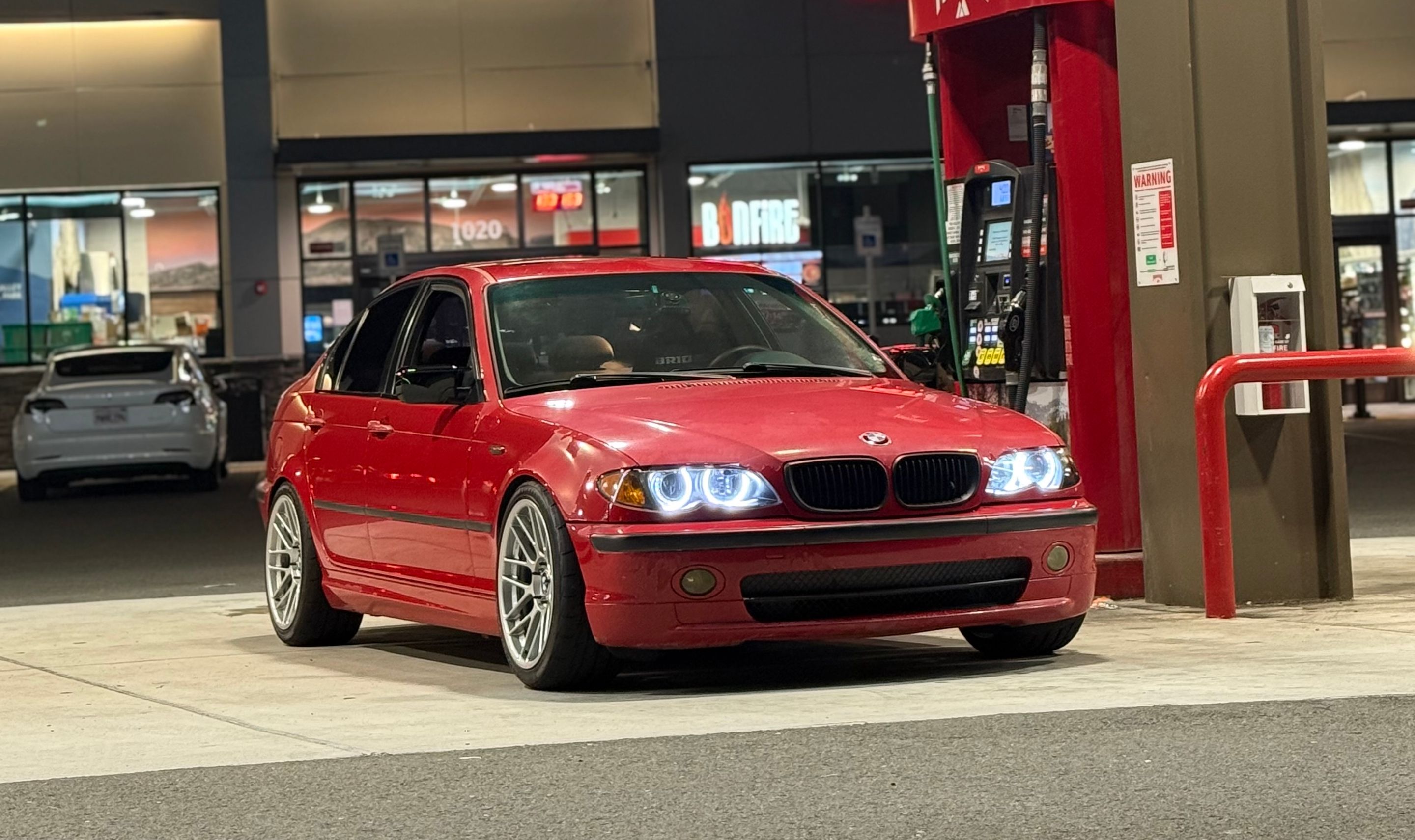 Red BMW E46 3 Series with 18" ARC-8RT Apex wheels in Race Silver