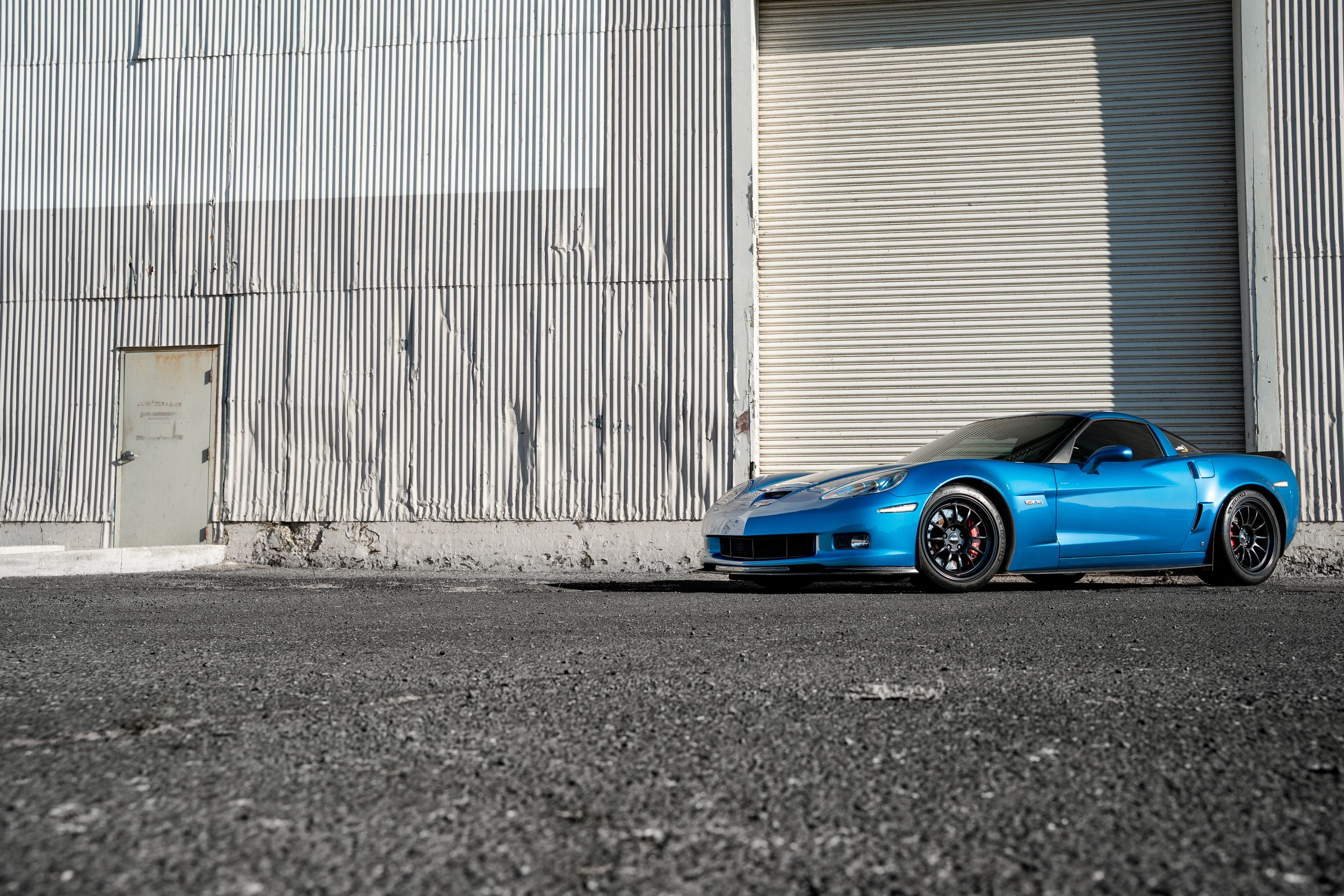Blue Chevrolet C6 Corvette Z06 with 18"/19" TEST-S Apex wheels in Satin Black