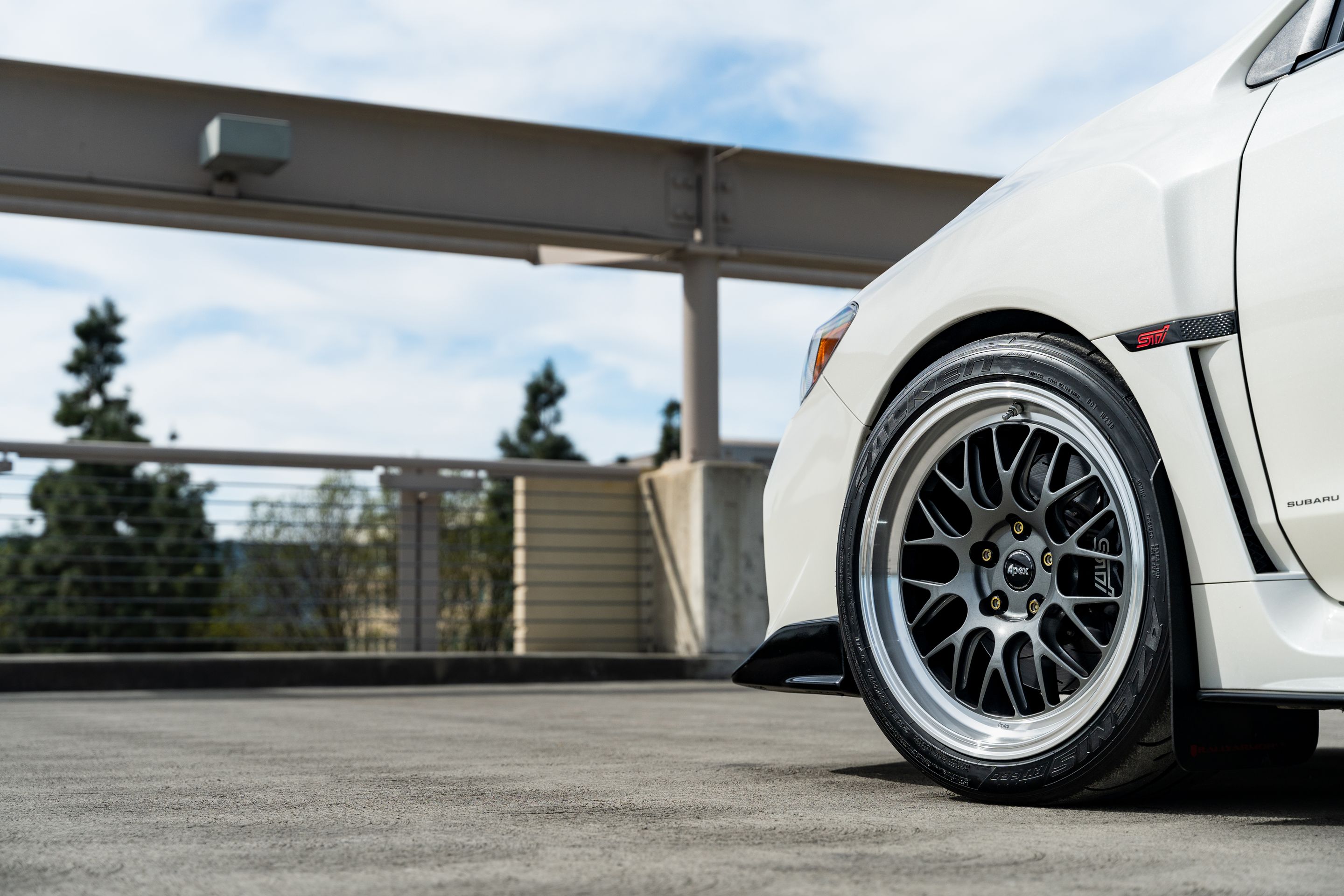 White Subaru VA WRX STI with 18" ML-10RT Apex wheels in Machined Lip Anthracite