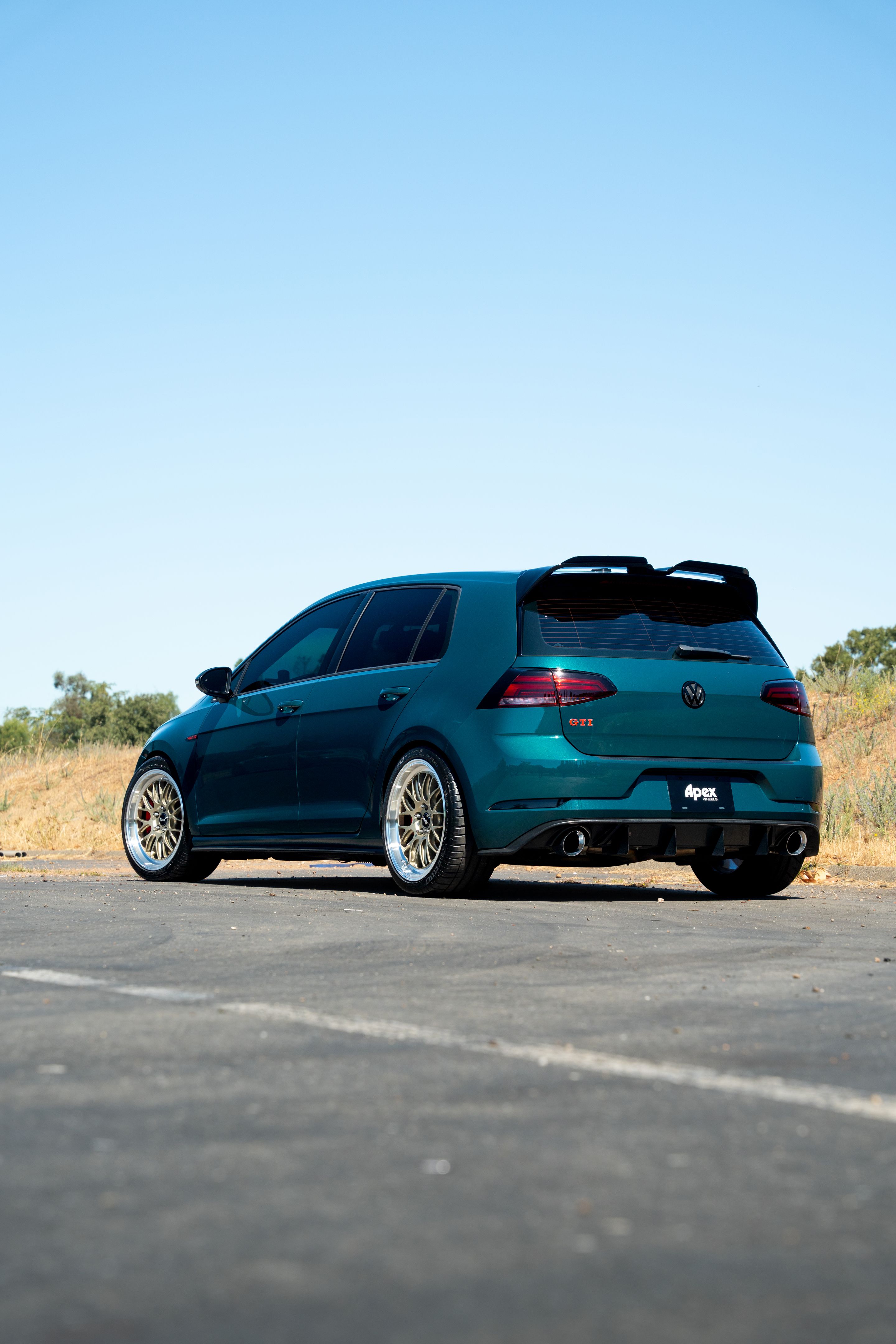 Green VW MK7 GTI with 18" ML-10RT Apex wheels in Machined Lip Gloss Motorsport Gold