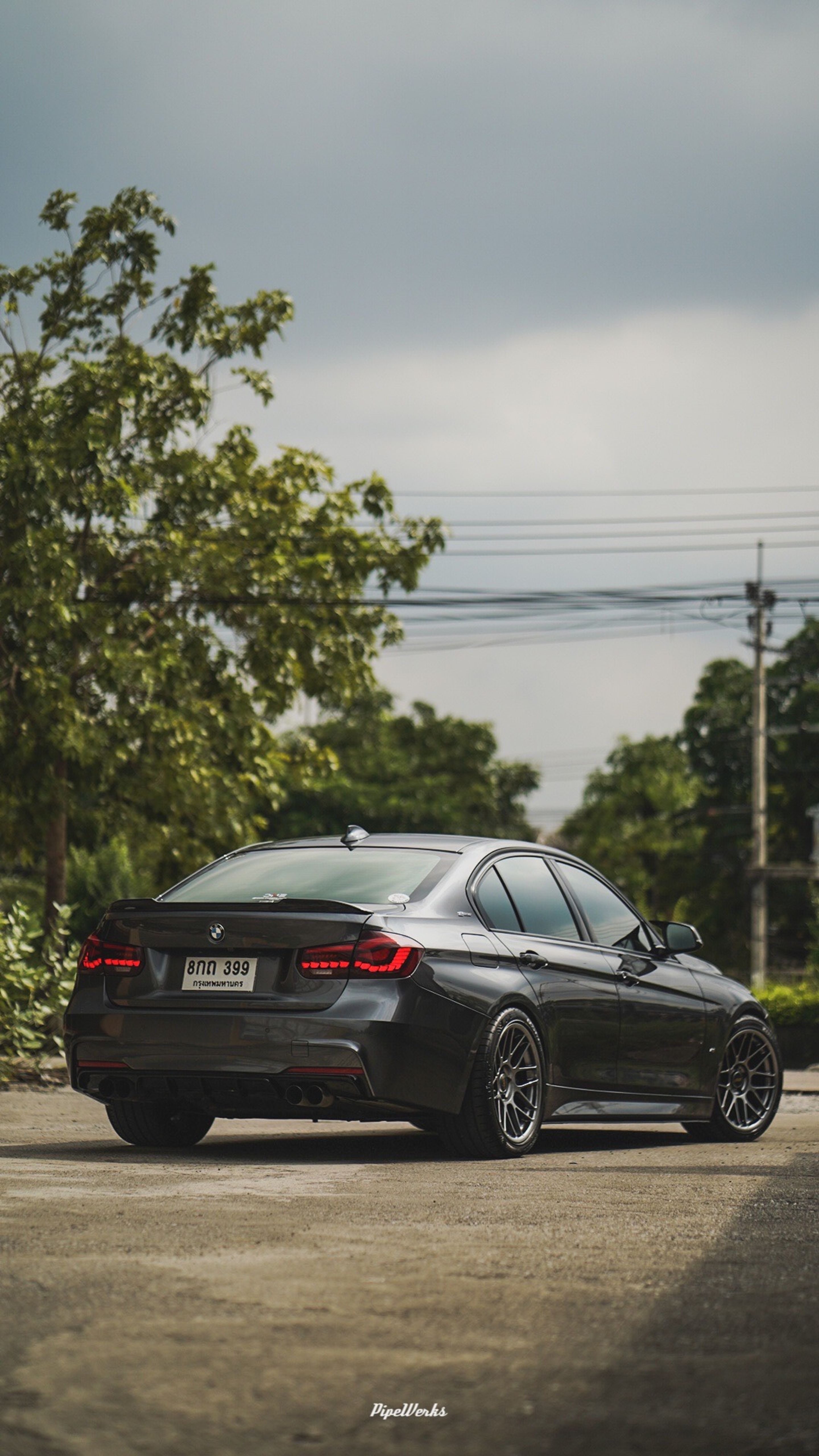 Grey BMW F30 Sedan 3 Series with 18" ARC-8 Apex wheels in Hyper Black