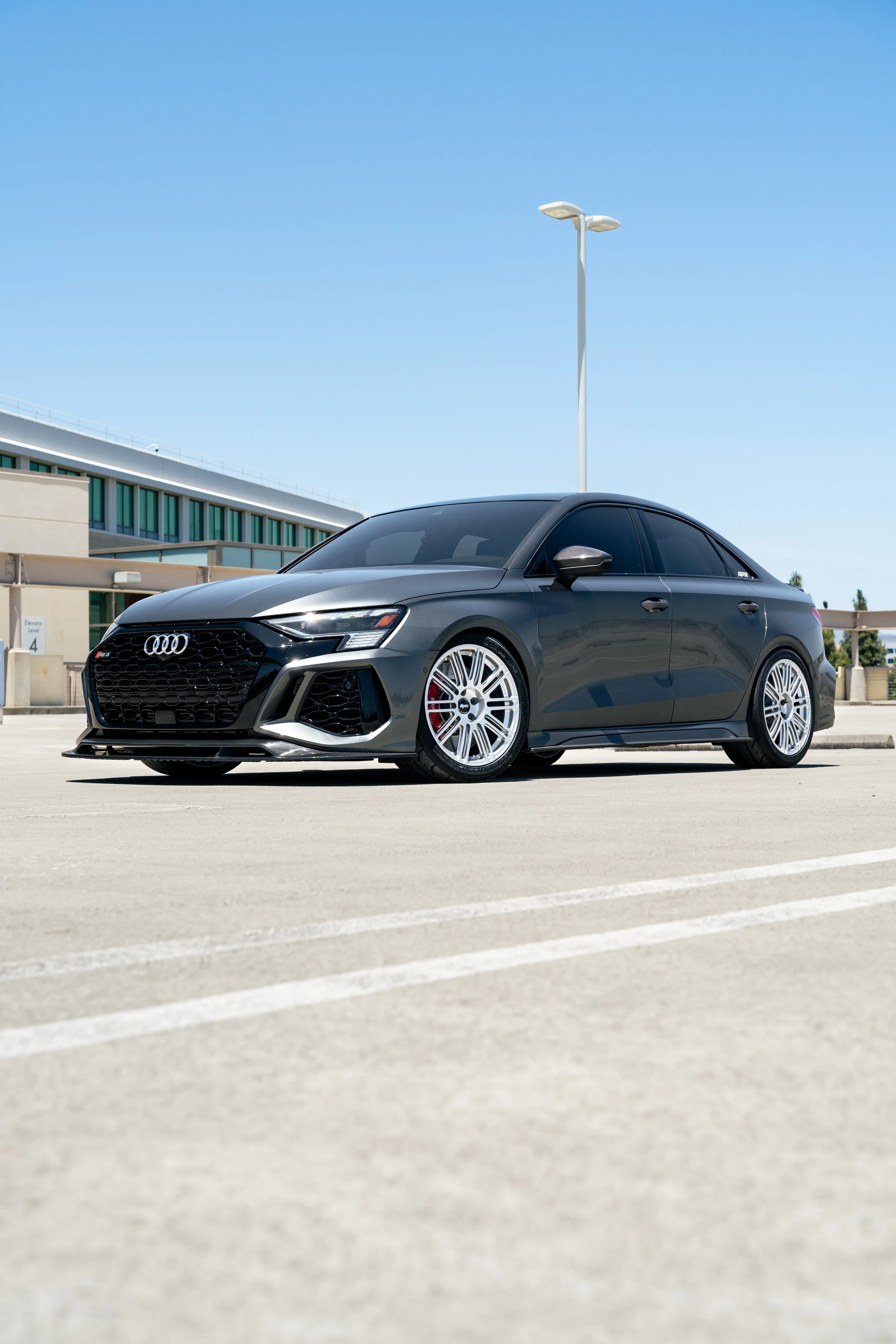 Grey Audi 8Y RS 3 with 18" TC-10RT Apex wheels in Race Silver