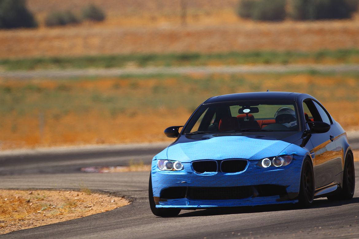 Black BMW E92 Coupe M3 with 18" ARC-8 Apex wheels in Satin Bronze