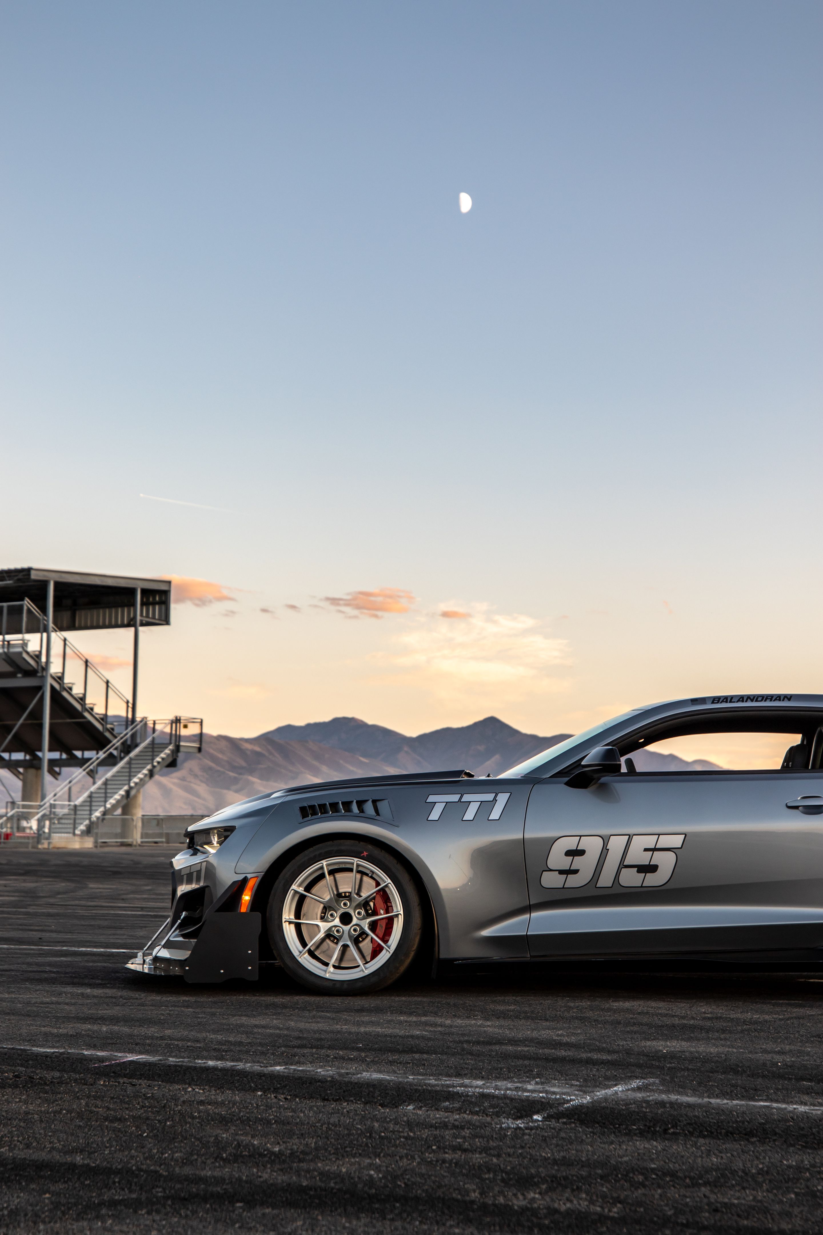 Grey Chevrolet 6th Gen Camaro ZL1 1LE with 18" VS-5RS Apex wheels in Brushed Clear