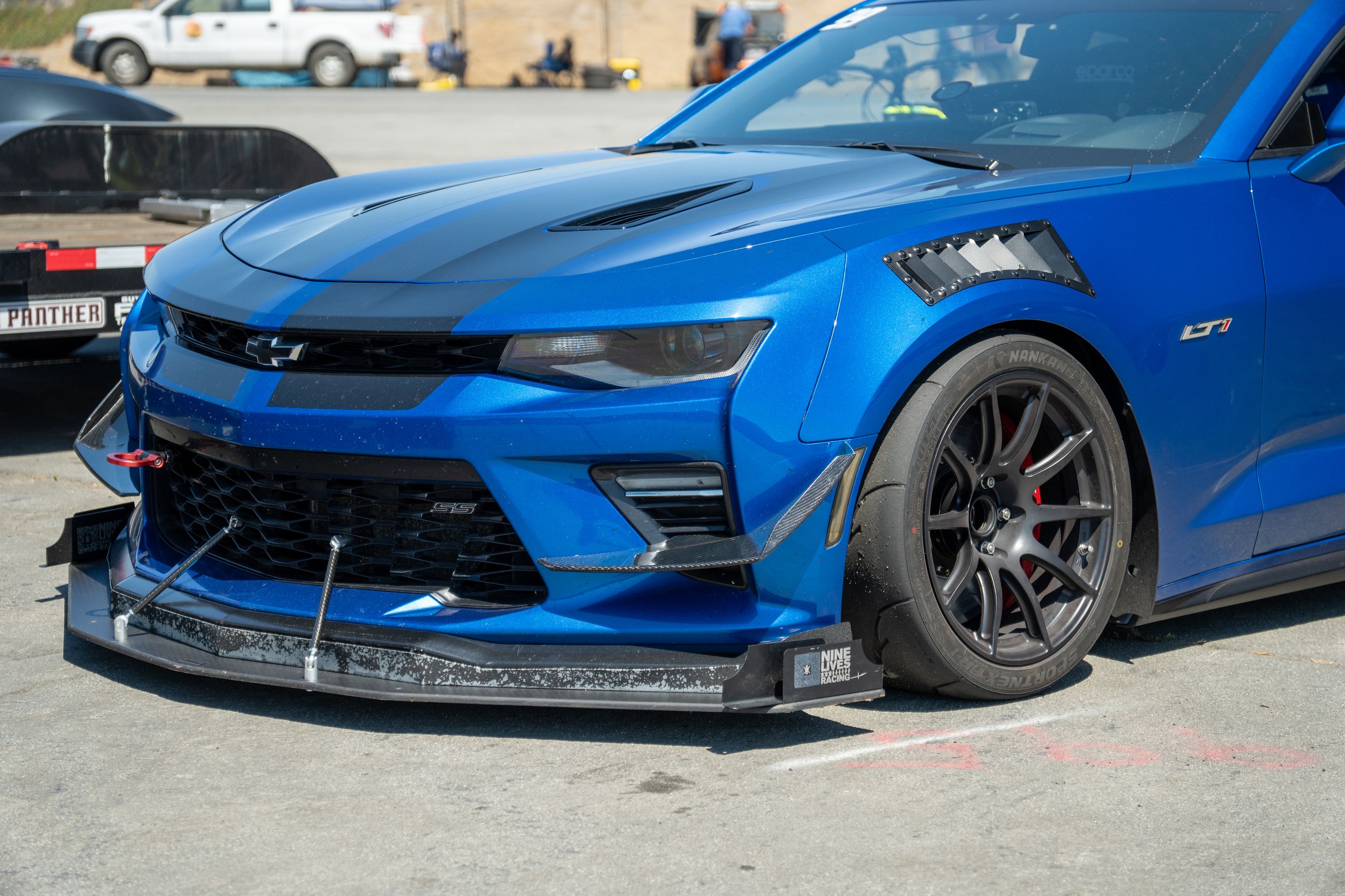 Blue Chevrolet 6th Gen Camaro SS with 18" SM-10 Apex wheels in Satin Black