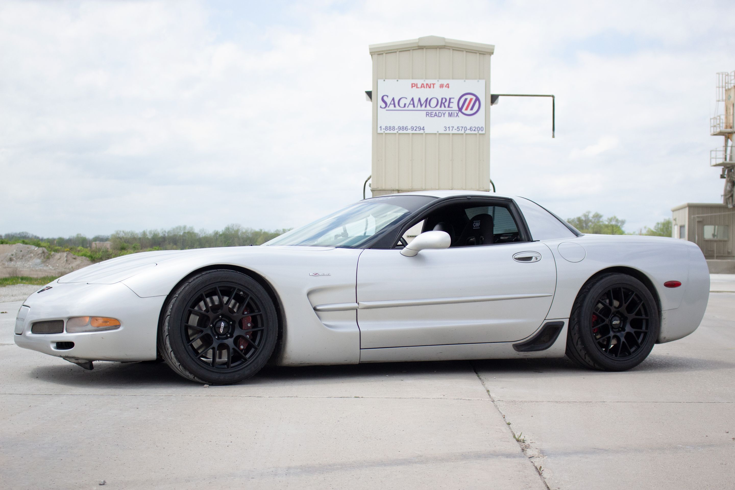 Silver Chevrolet C5 Corvette Z06 with 18" EC-7 Apex wheels in Satin Black