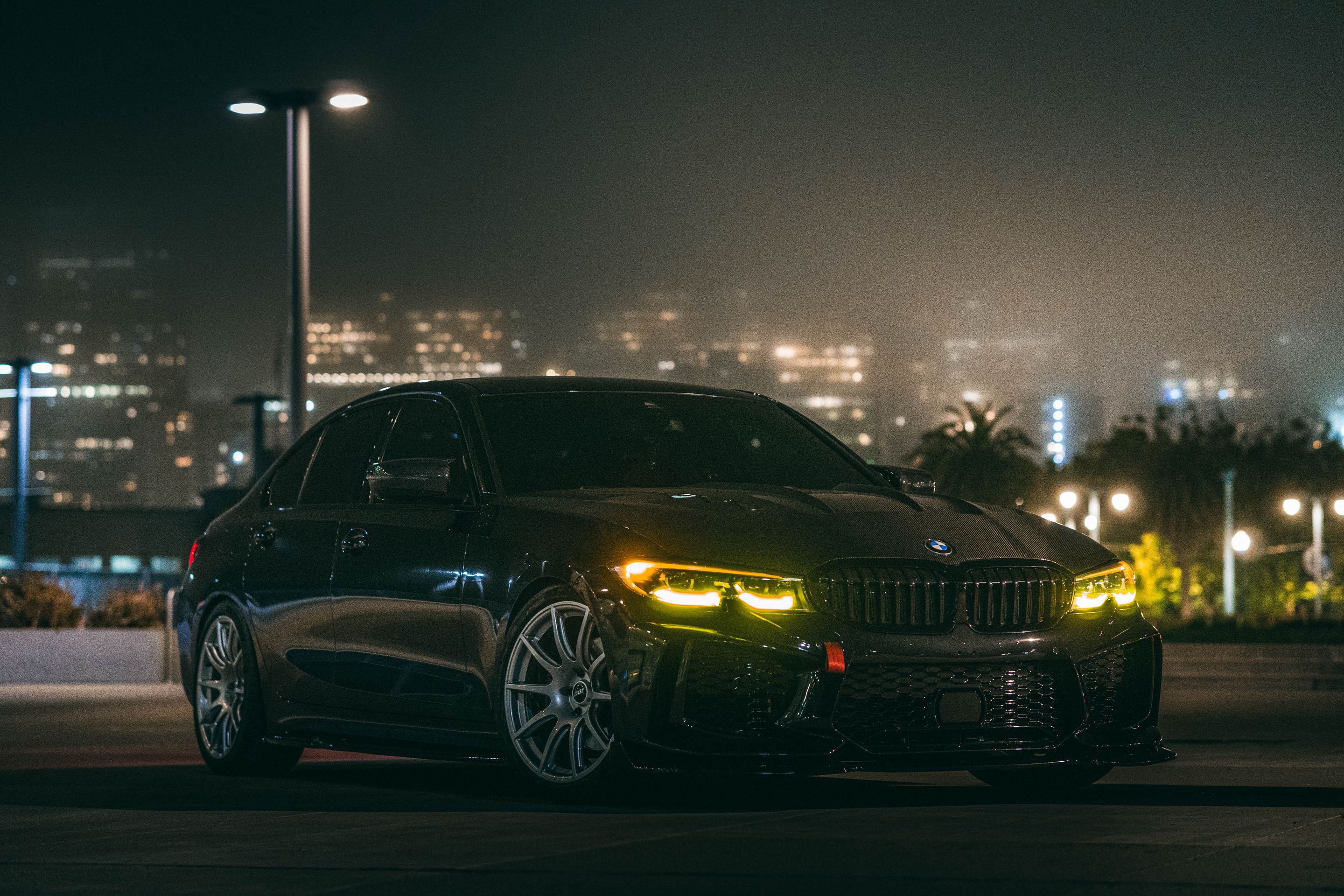 Black BMW G20 Sedan 3 Series with 19" SM-10 Apex wheels in Race Silver