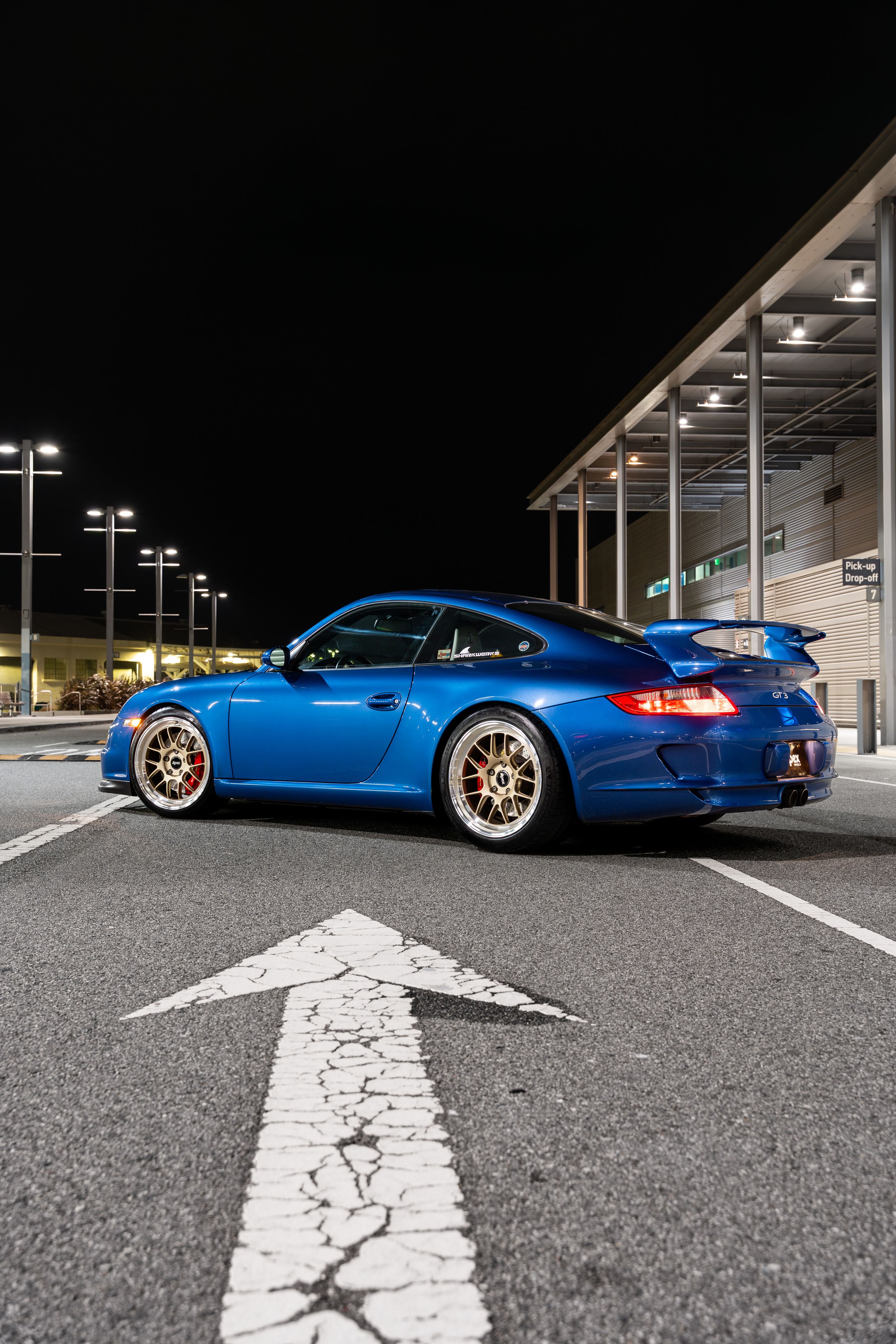 Blue Porsche 911 997 GT3 with 19" TEST-M Apex wheels in Machined Lip Gloss Motorsport Gold