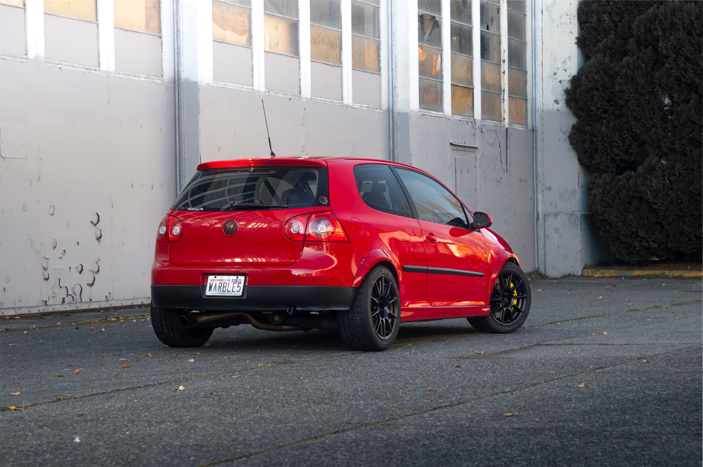 Red VW MK5 Golf with 17" SM-10 Apex wheels in Satin Black