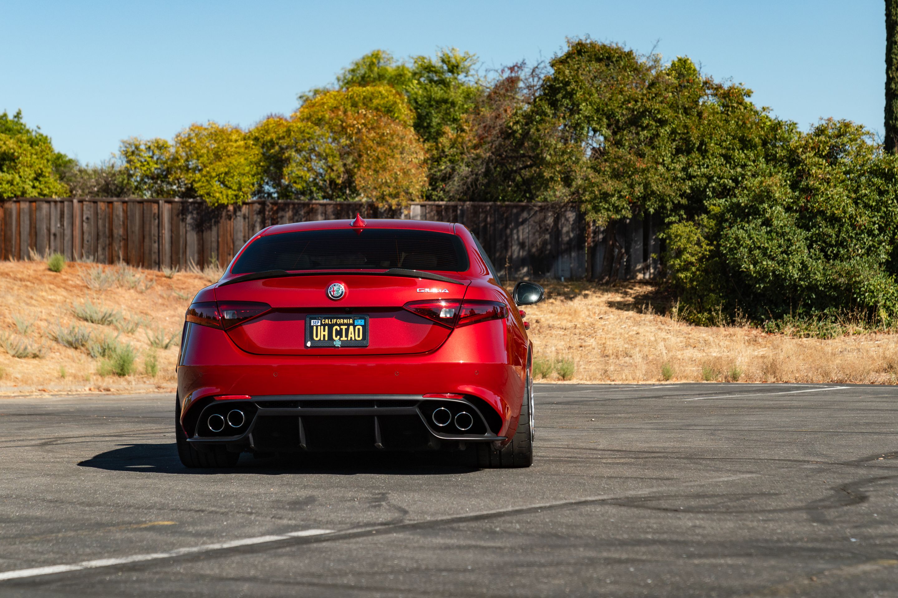Red Alfa Romeo Giulia Quadrifoglio with 19" VS-5RS Apex wheels in Brushed Clear
