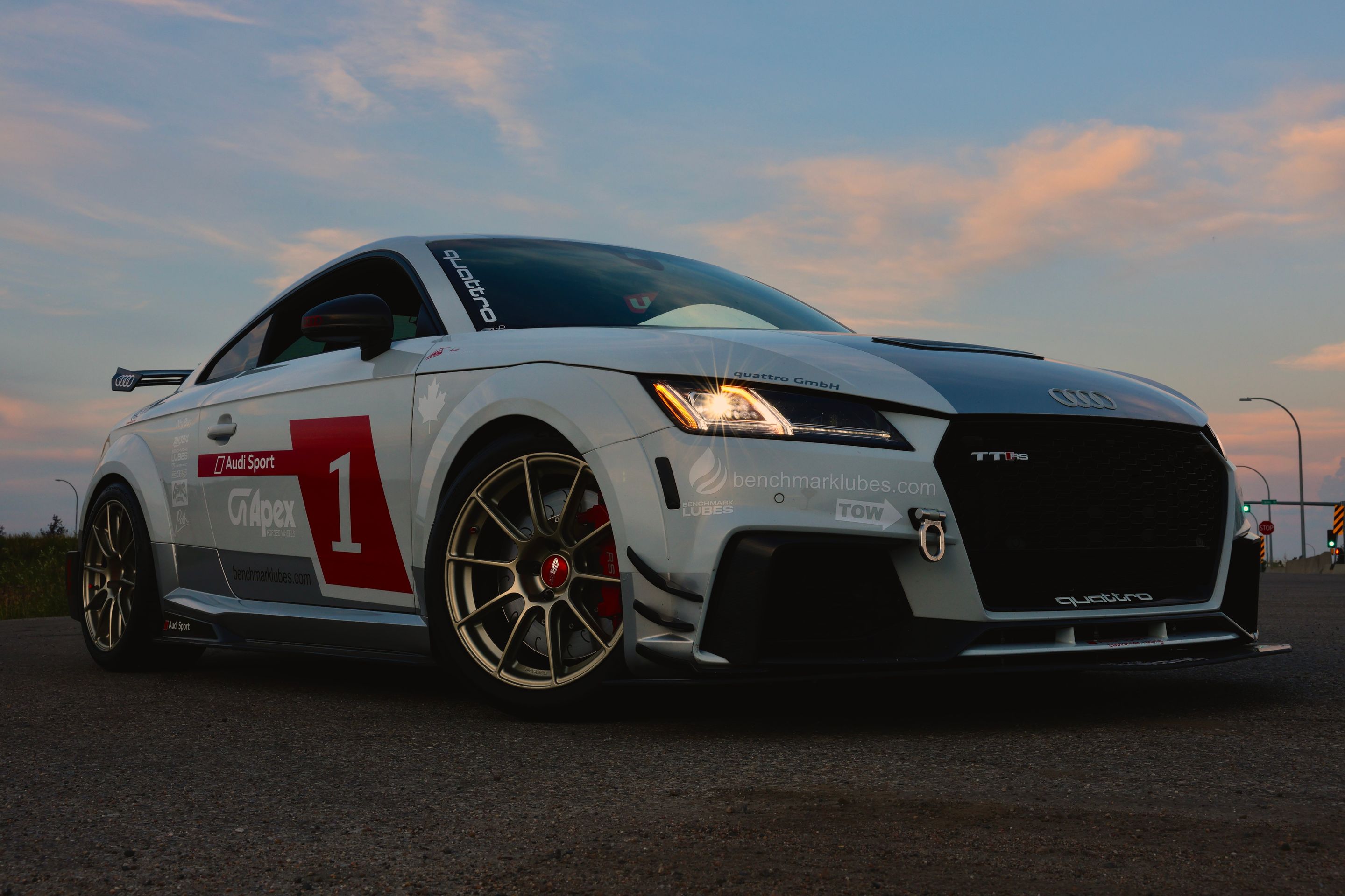 White Audi FV/8S TT RS with 18" SM-10RS Apex wheels in Motorsport Gold