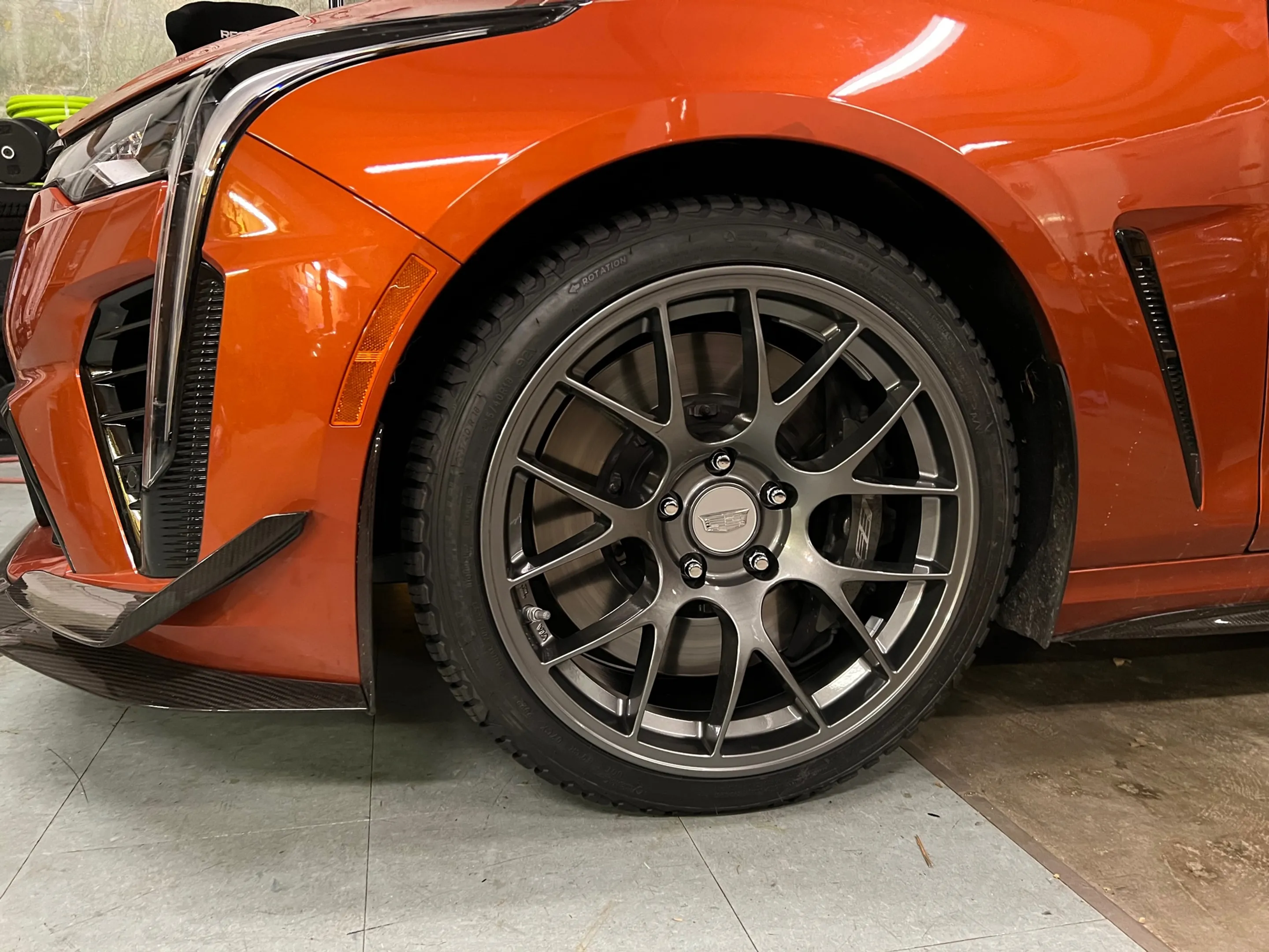 Orange Cadillac CT4-V Blackwing with 18" EC-7 Apex wheels in Anthracite