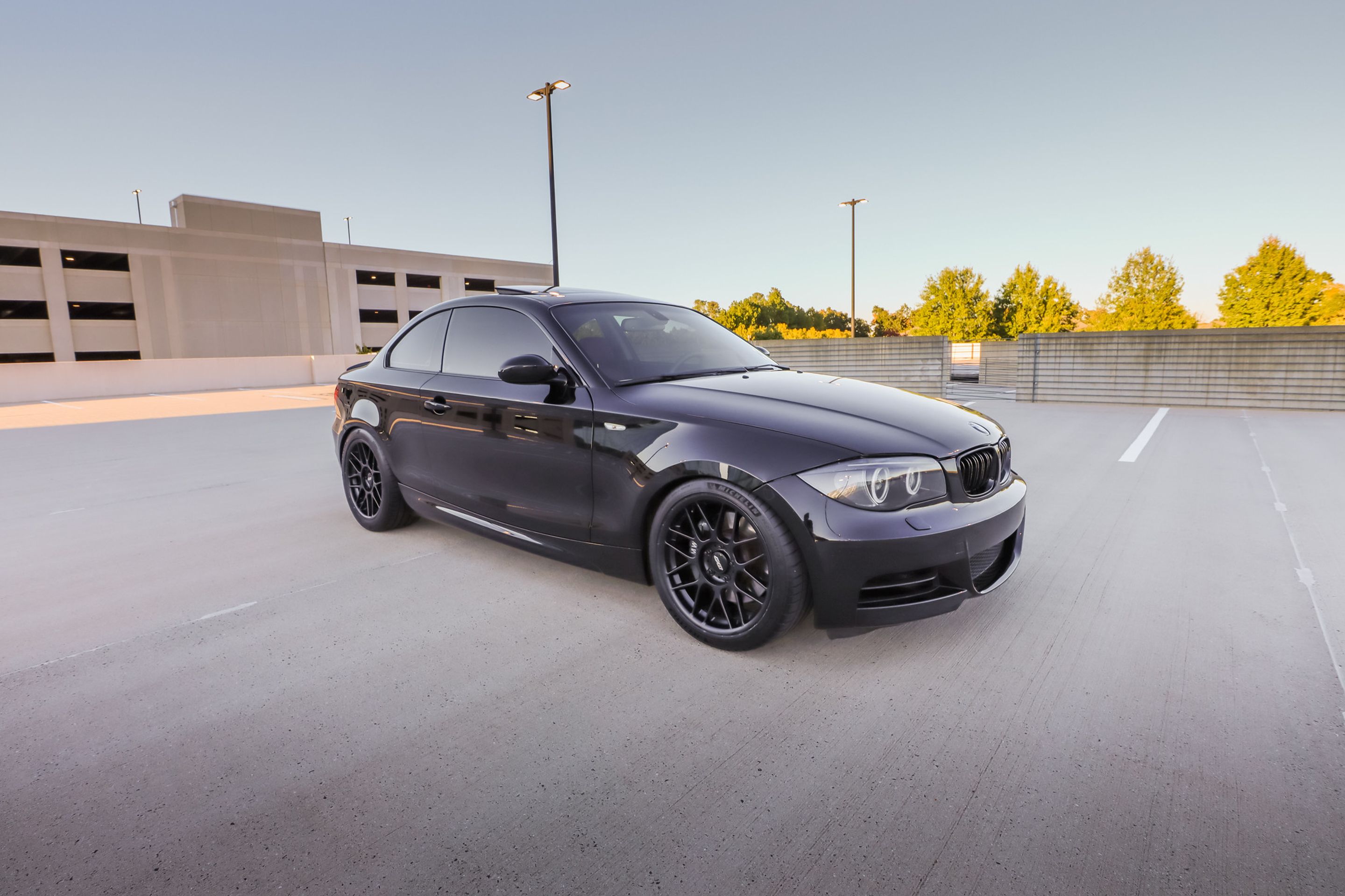 Black BMW E82 Coupe 1 Series with 18" ARC-8 Apex wheels in Satin Black