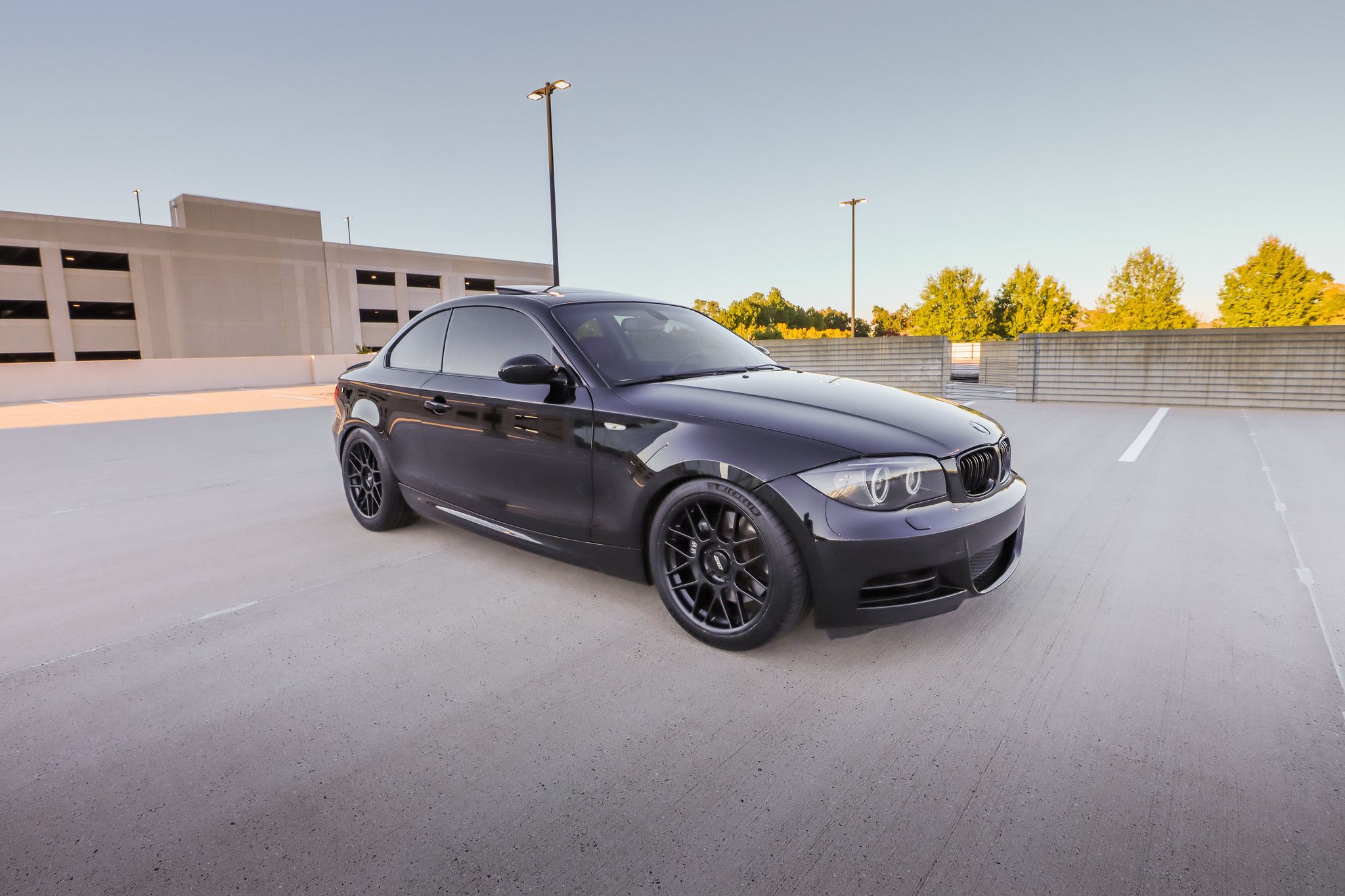 Black BMW E82 Coupe 1 Series with 18" ARC-8 Apex wheels in Satin Black