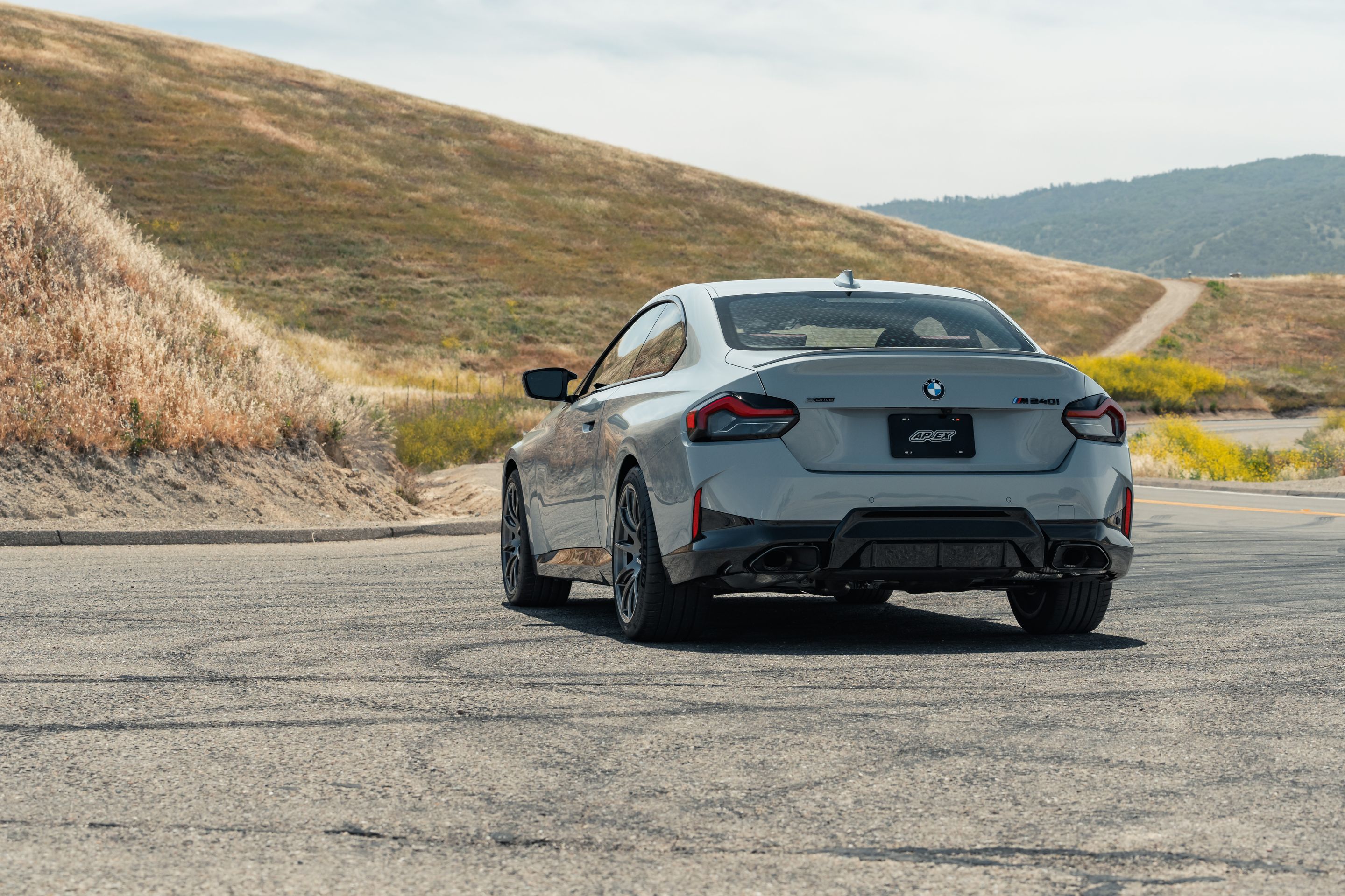 Grey BMW G42 2 Series with 19" SM-10 Apex wheels in Anthracite