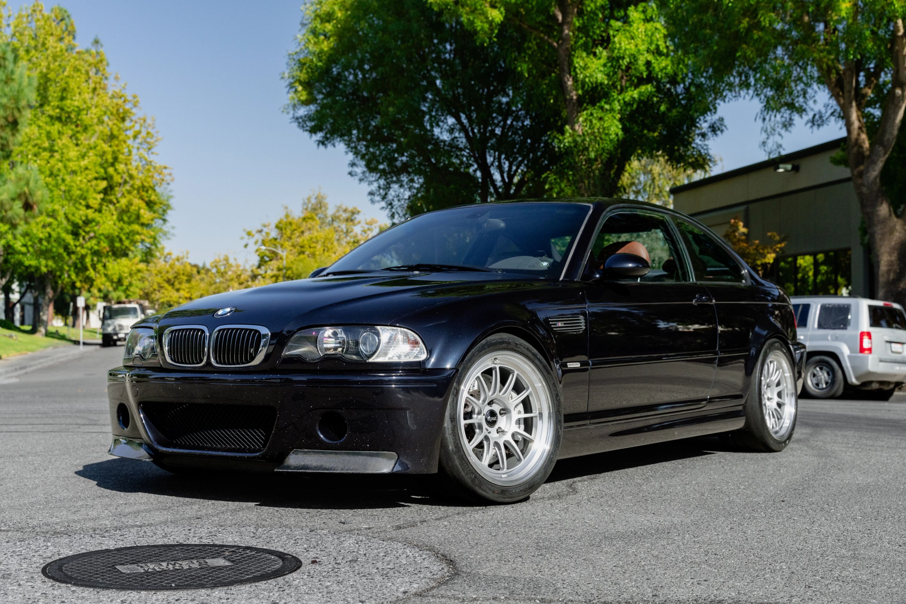 Black BMW E46 M3 with 18" SL-12 Apex wheels in Machined Lip Race Silver