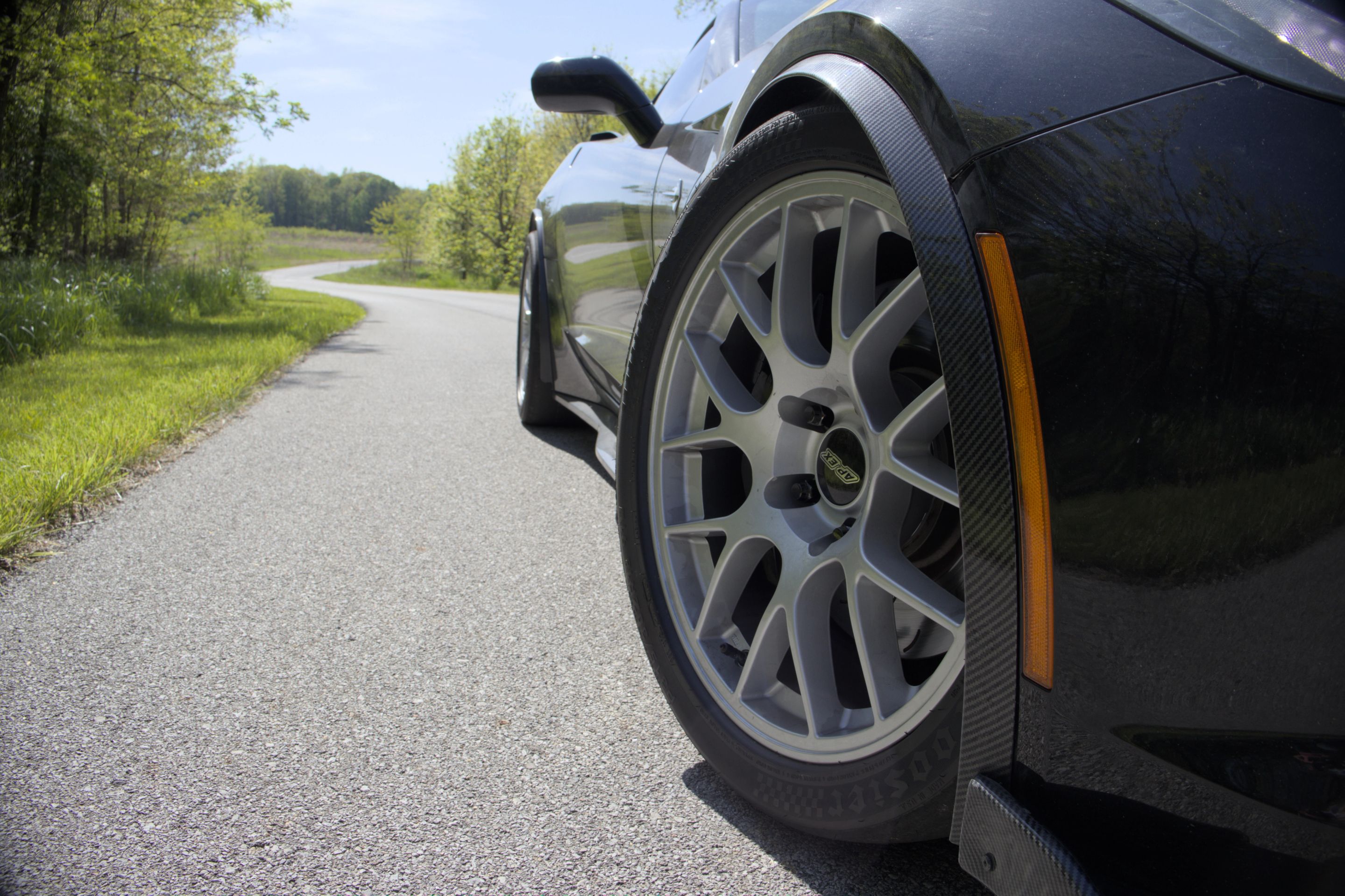 Grey Chevrolet C7 Corvette Stingray/Z51 with 18" EC-7 Apex wheels in Race Silver