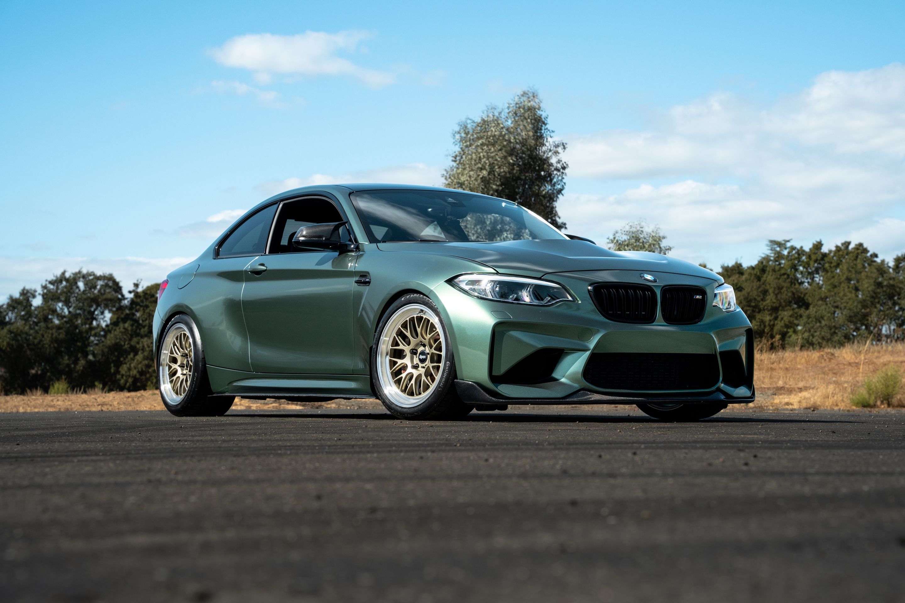 Green BMW F87 M2 with 18" ML-10RT Apex wheels in Machined Lip Gloss Motorsport Gold