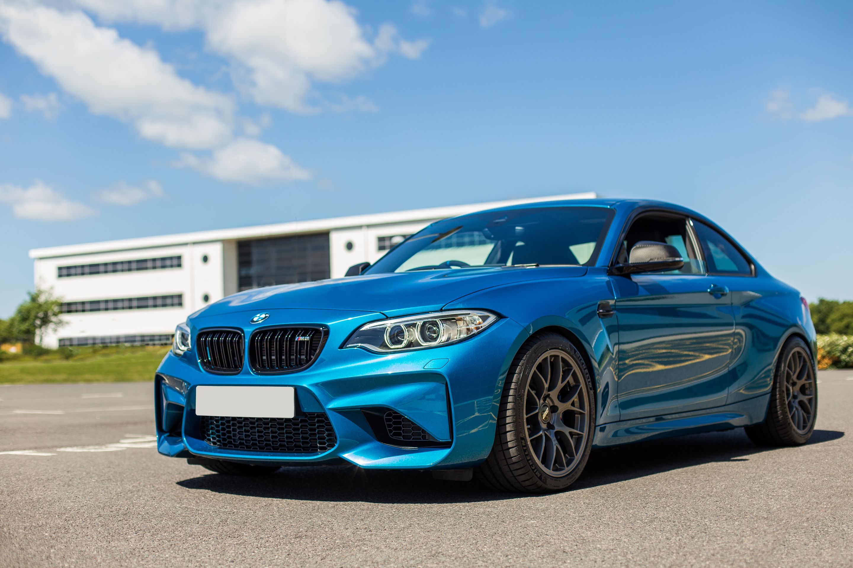 Blue BMW F87 M2 with 18" EC-7 Apex wheels in Anthracite