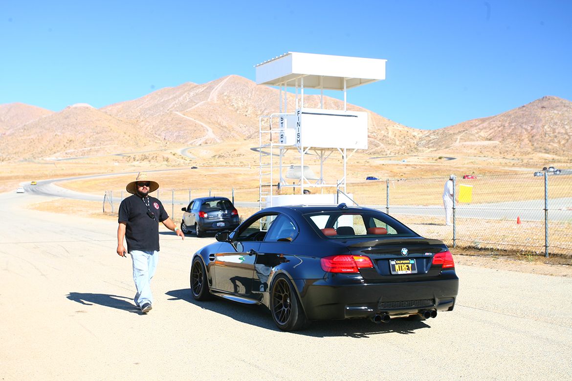 Black BMW E92 Coupe M3 with 18" ARC-8 Apex wheels in Satin Bronze