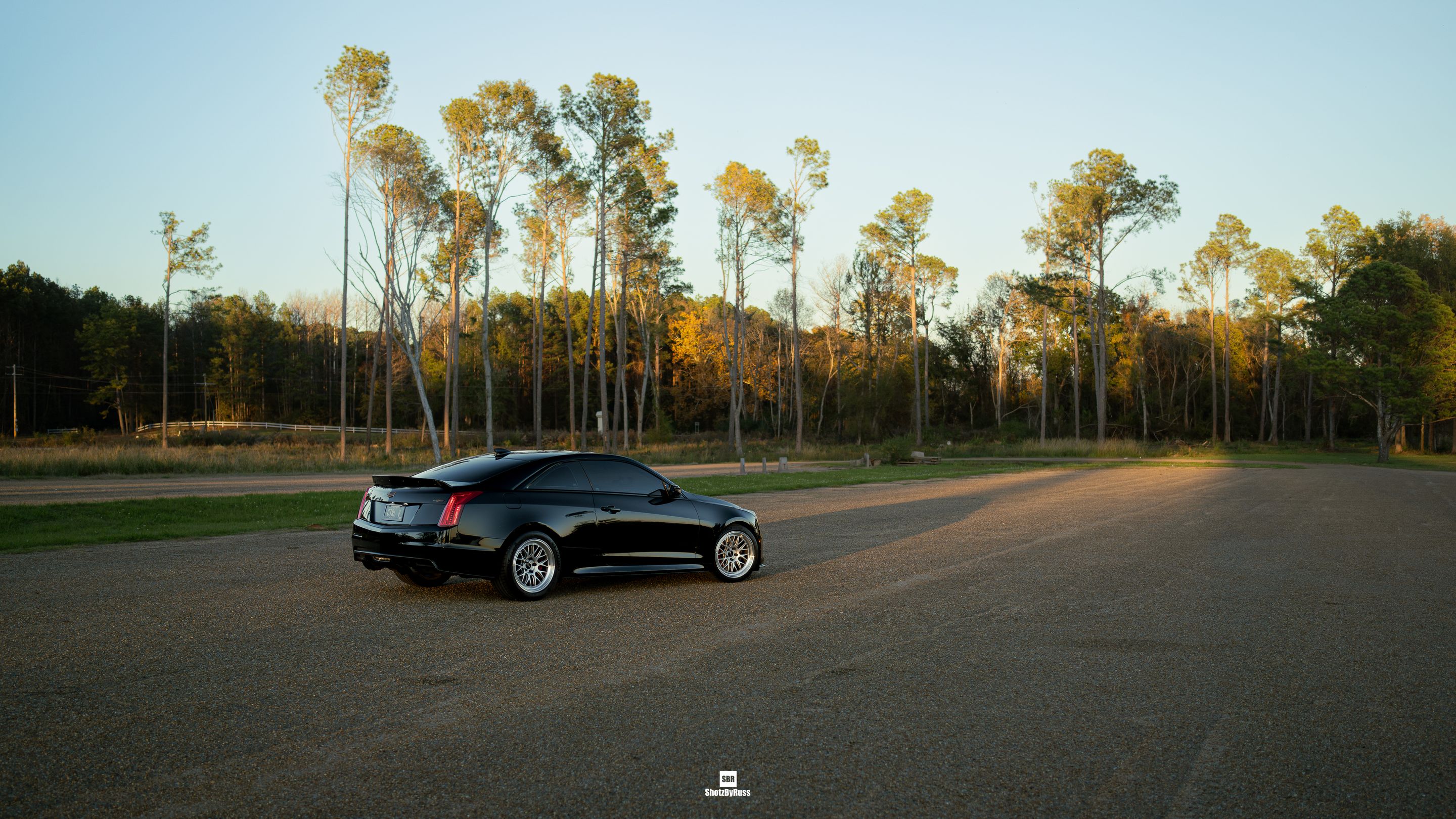 Black Cadillac ATS-V with 18" ML-10RT Apex wheels in Machined Lip Race Silver