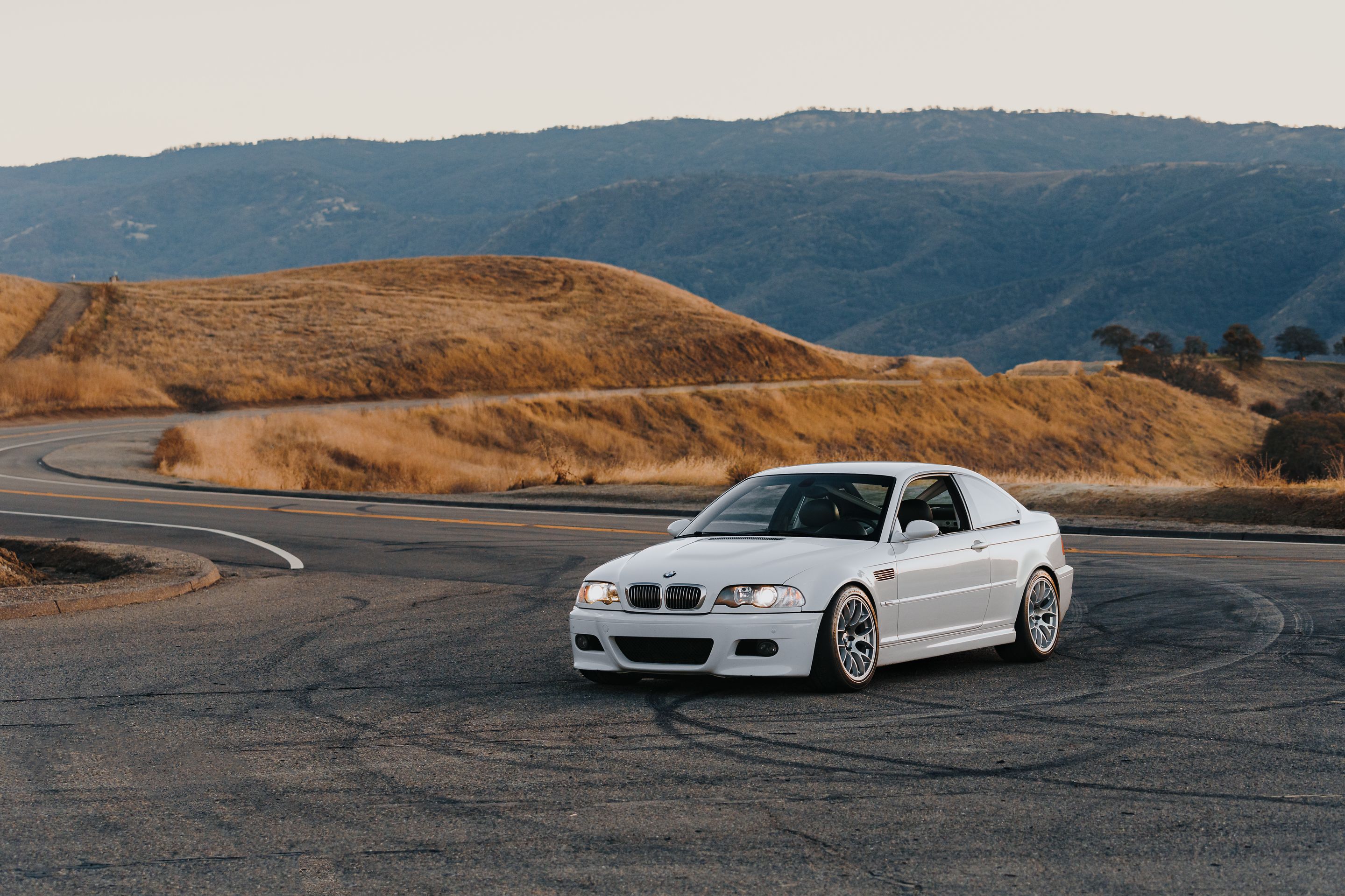 White BMW E46 M3 with 18" EC-7 Apex wheels in Race Silver