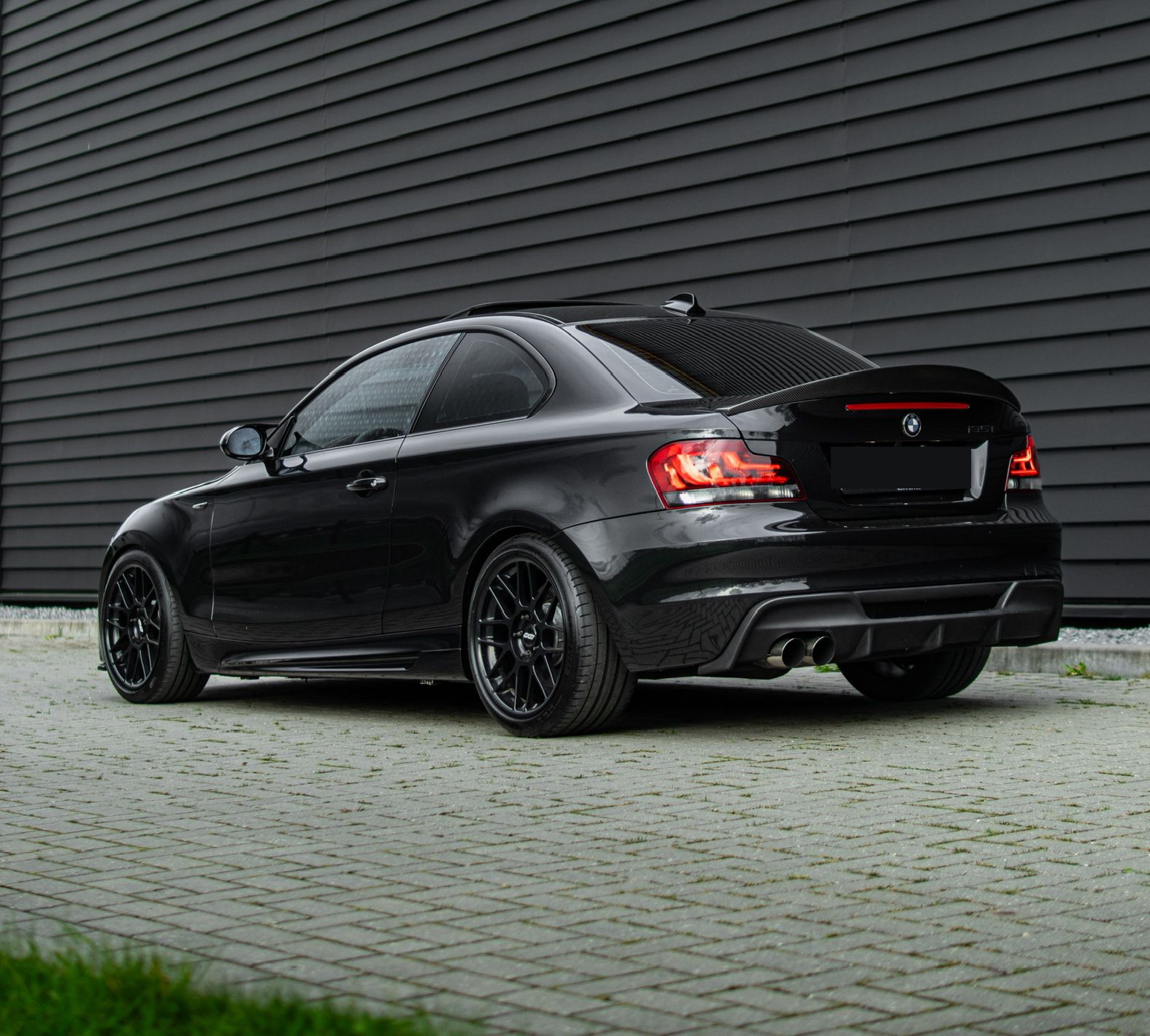 Black BMW E82 Coupe 1 Series with 18" ARC-8 Apex wheels in Satin Black
