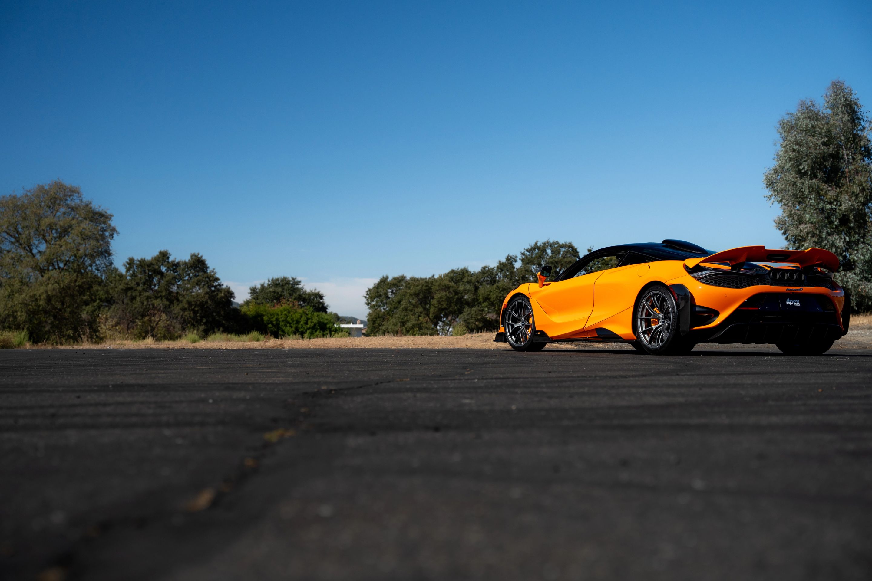 Orange McLaren 765LT with 19"/20" VS-5RS Apex wheels in Anthracite