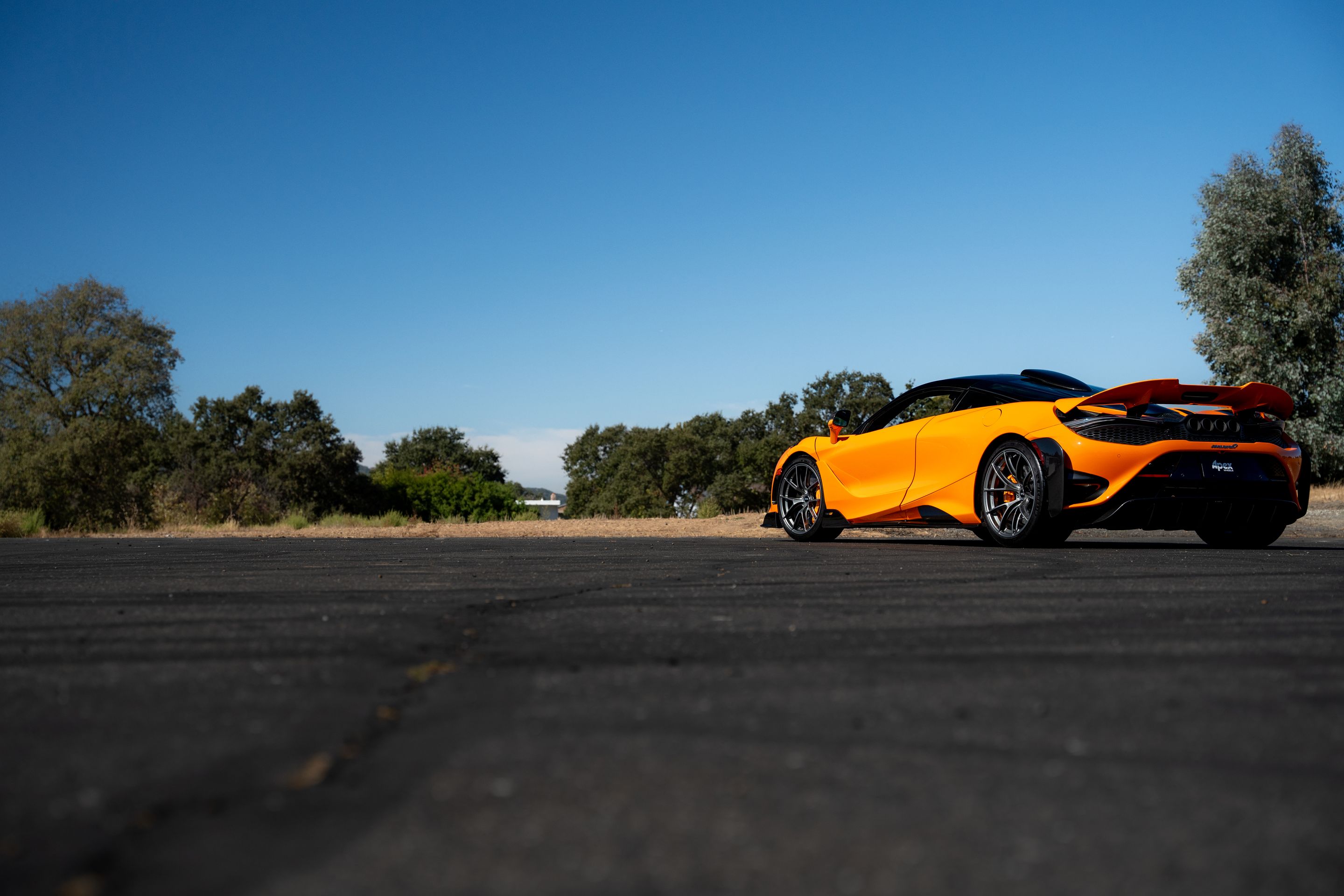 Orange McLaren 765LT with 19"/20" VS-5RS Apex wheels in Anthracite