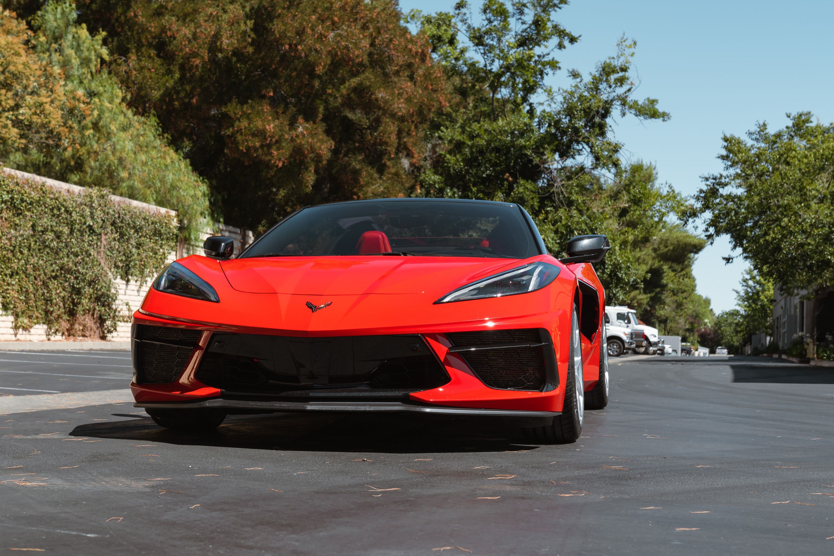 Red Chevrolet C8 Corvette Stingray/Z51 with 19" VS-5RS Apex wheels in Brushed Clear