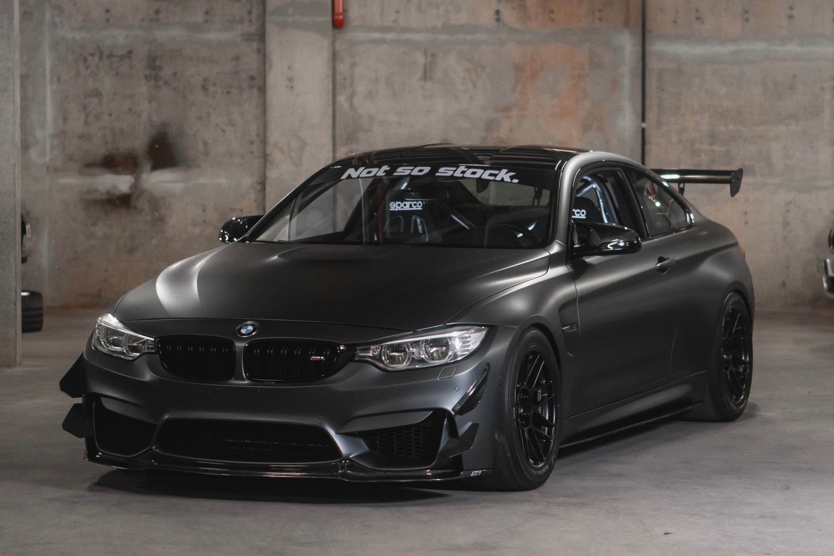 Black BMW F82 Coupe M4 with 18" ARC-8 Apex wheels in Satin Black