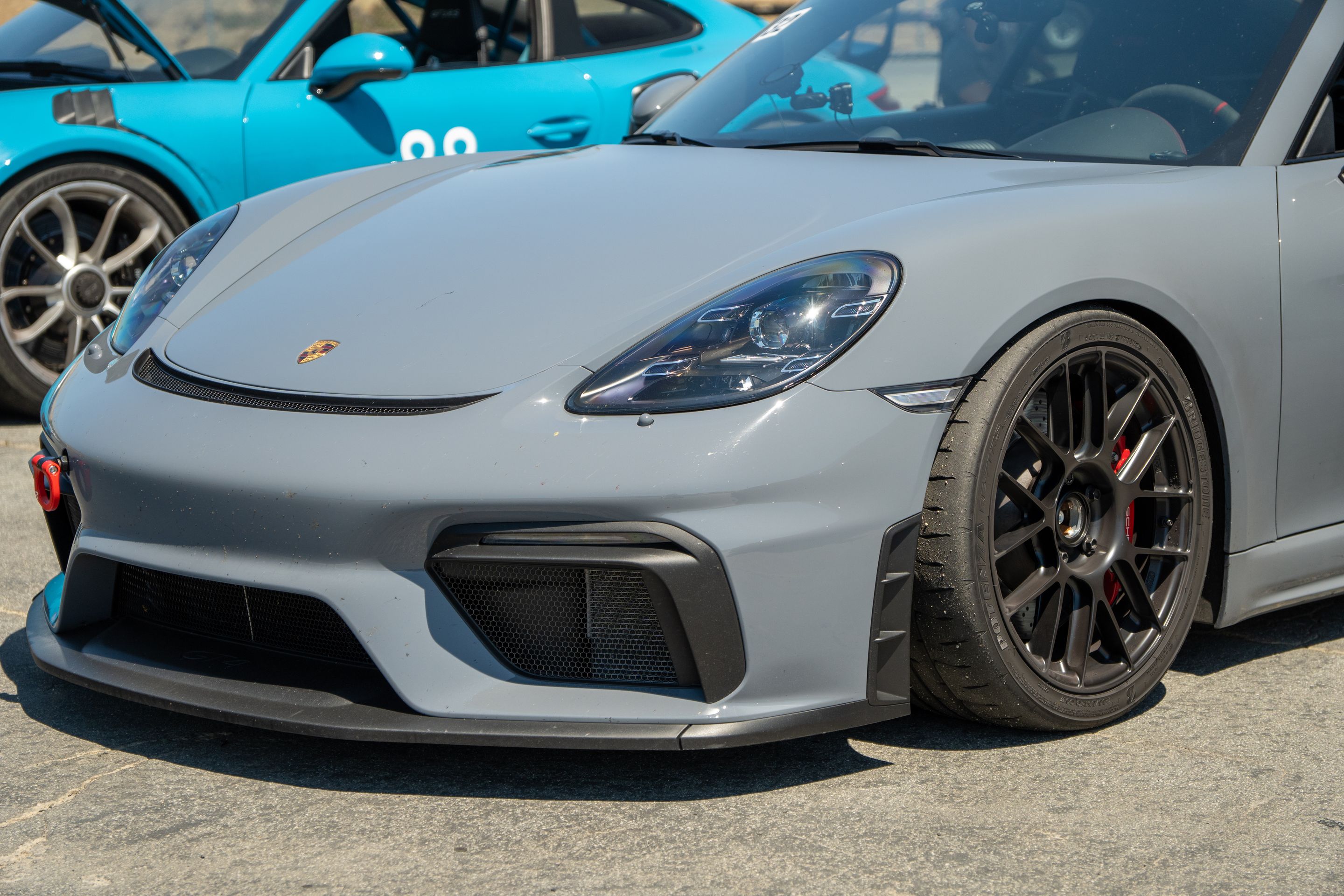 Grey Porsche 718 Cayman GT4 with 19" EC-7RS Apex wheels in Satin Black