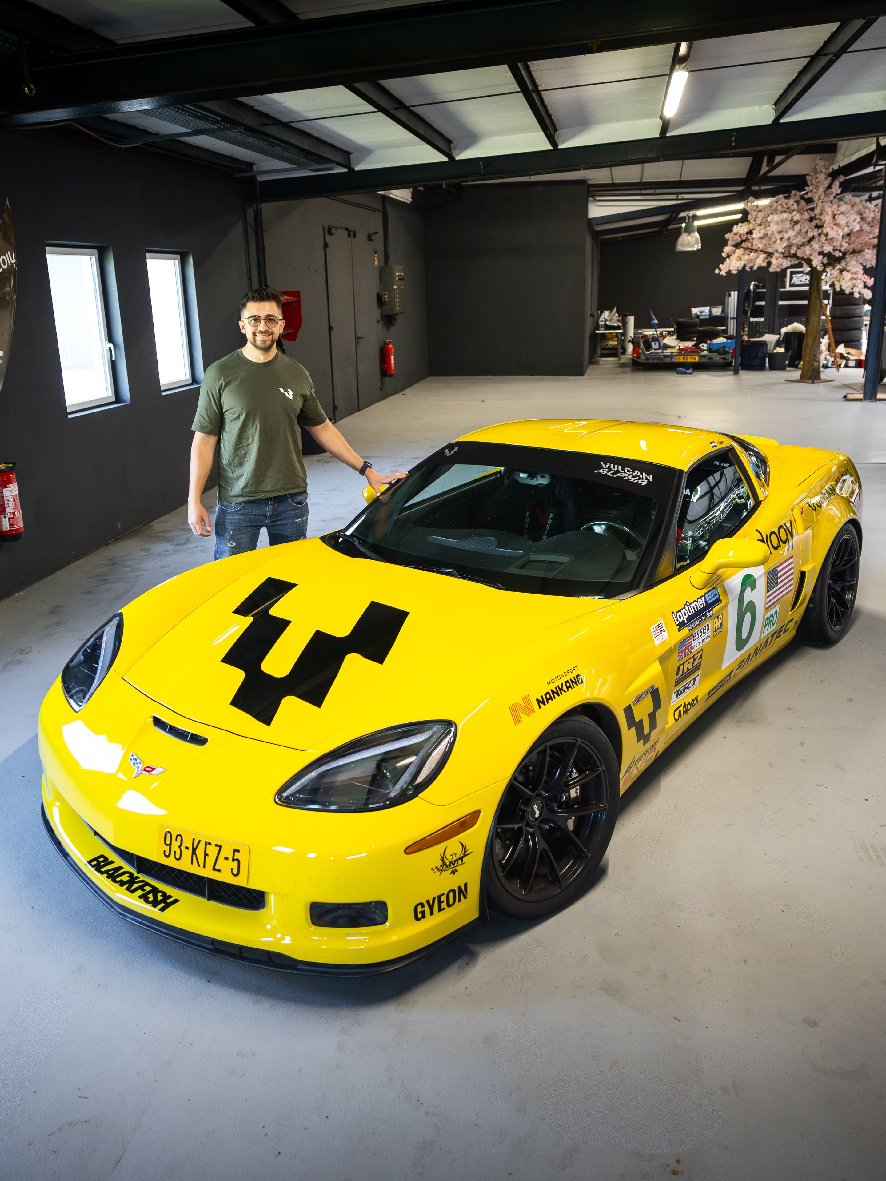 Yellow Chevrolet C6 Corvette Z06 with 18" VS-5RS Apex wheels in Satin Black
