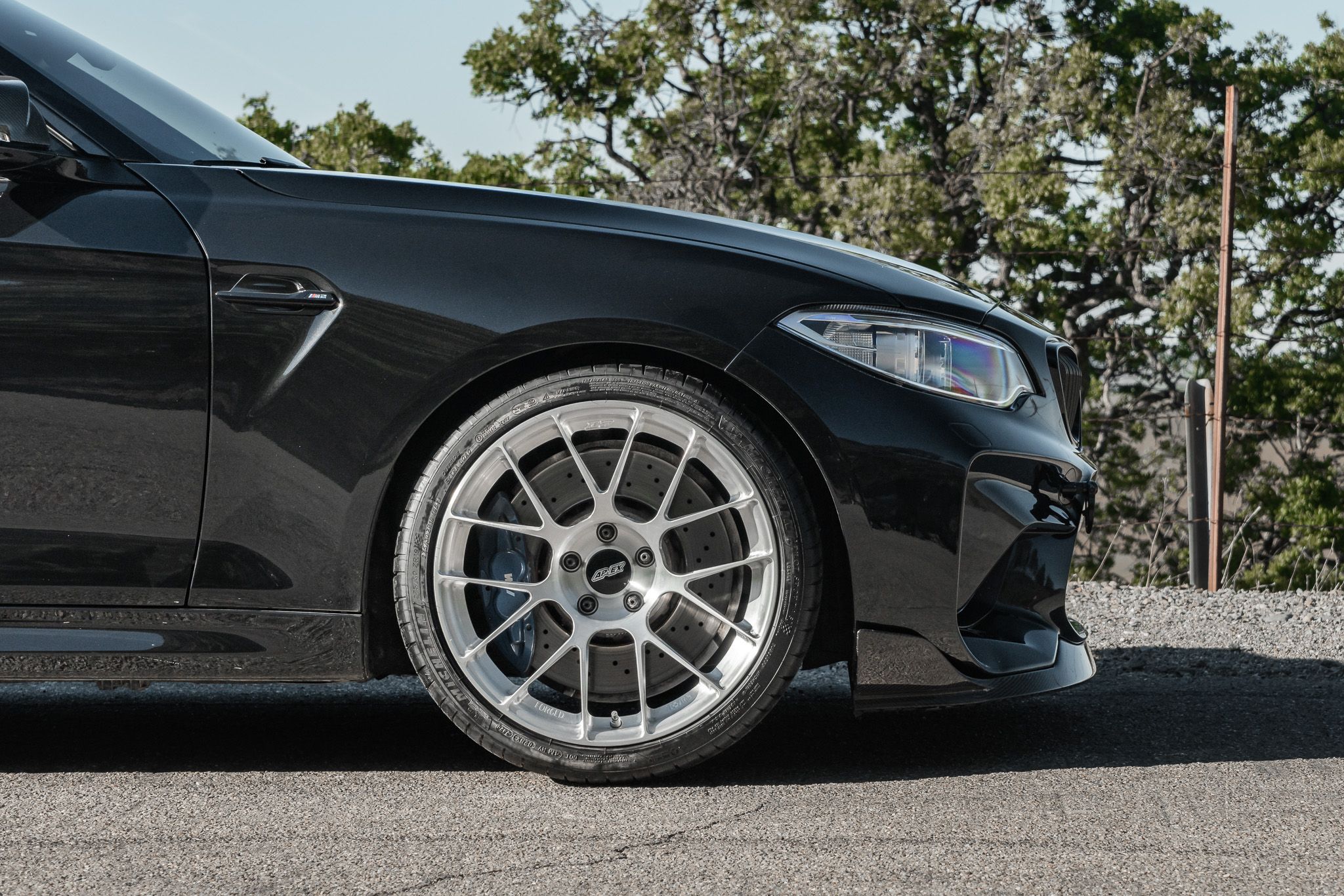 Black BMW F87 M2 with 19" EC-7RS Apex wheels in Brushed Clear