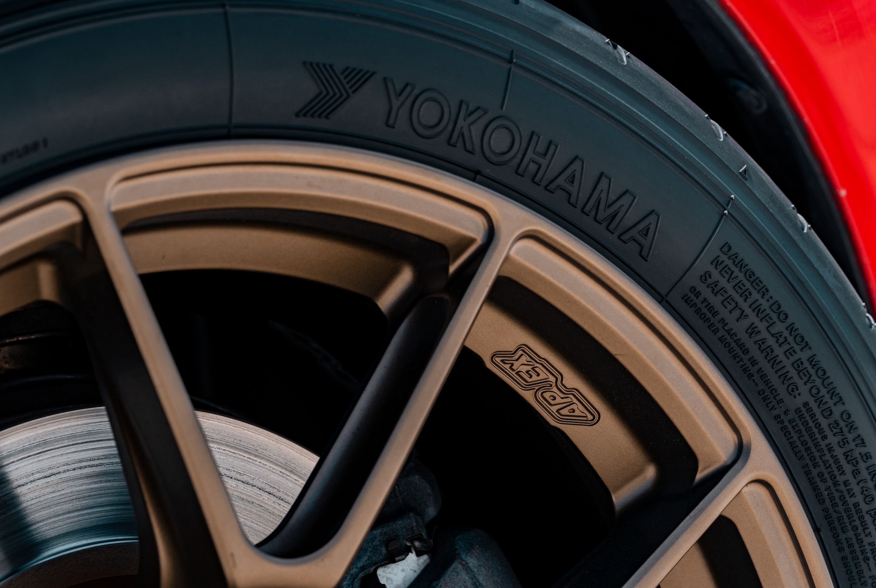 Red Honda S2000 with 17" VS-5RS Apex wheels in Satin Bronze