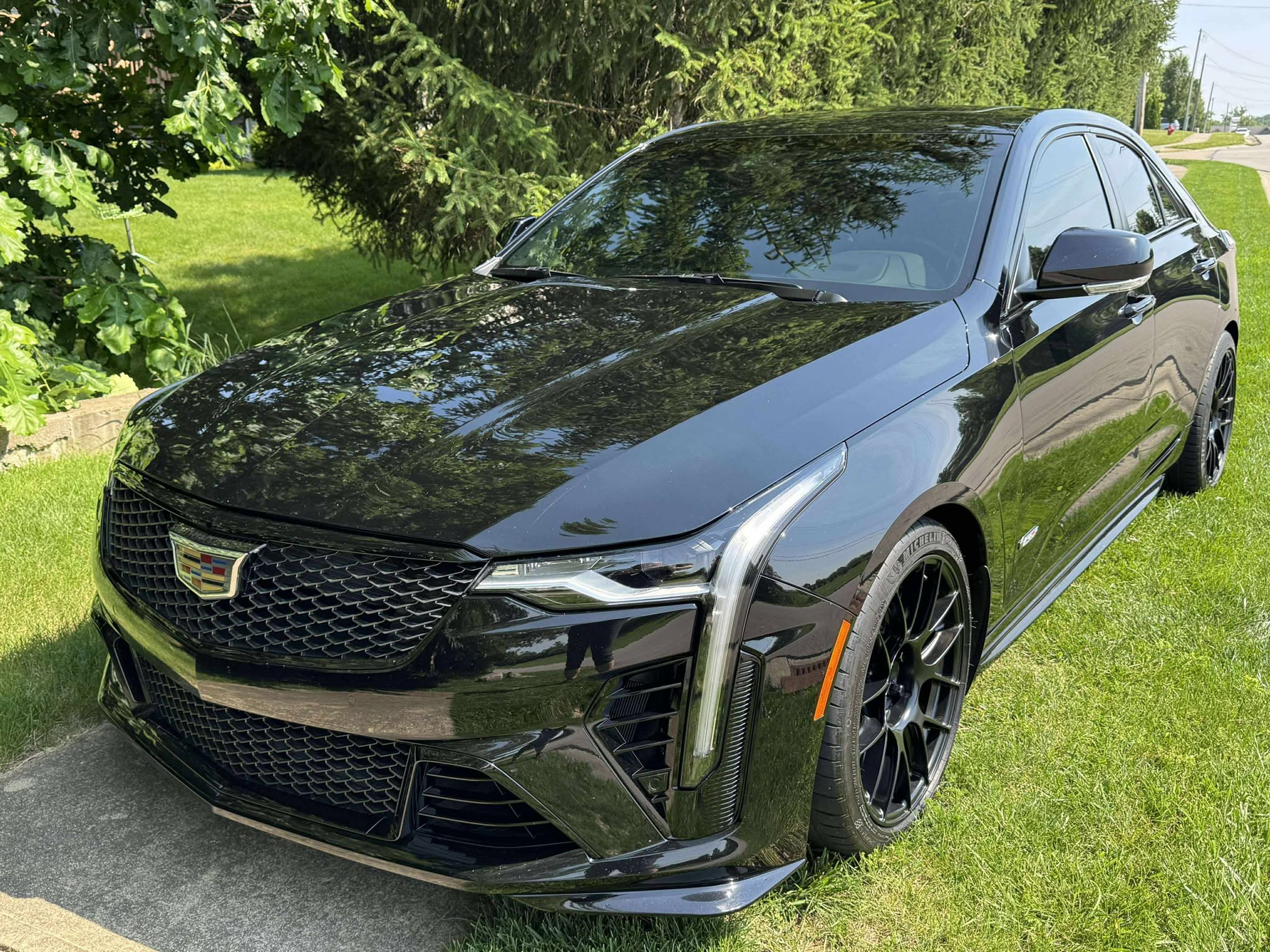 Black Cadillac CT4-V Blackwing with 18" EC-7RS Apex wheels in Satin Black