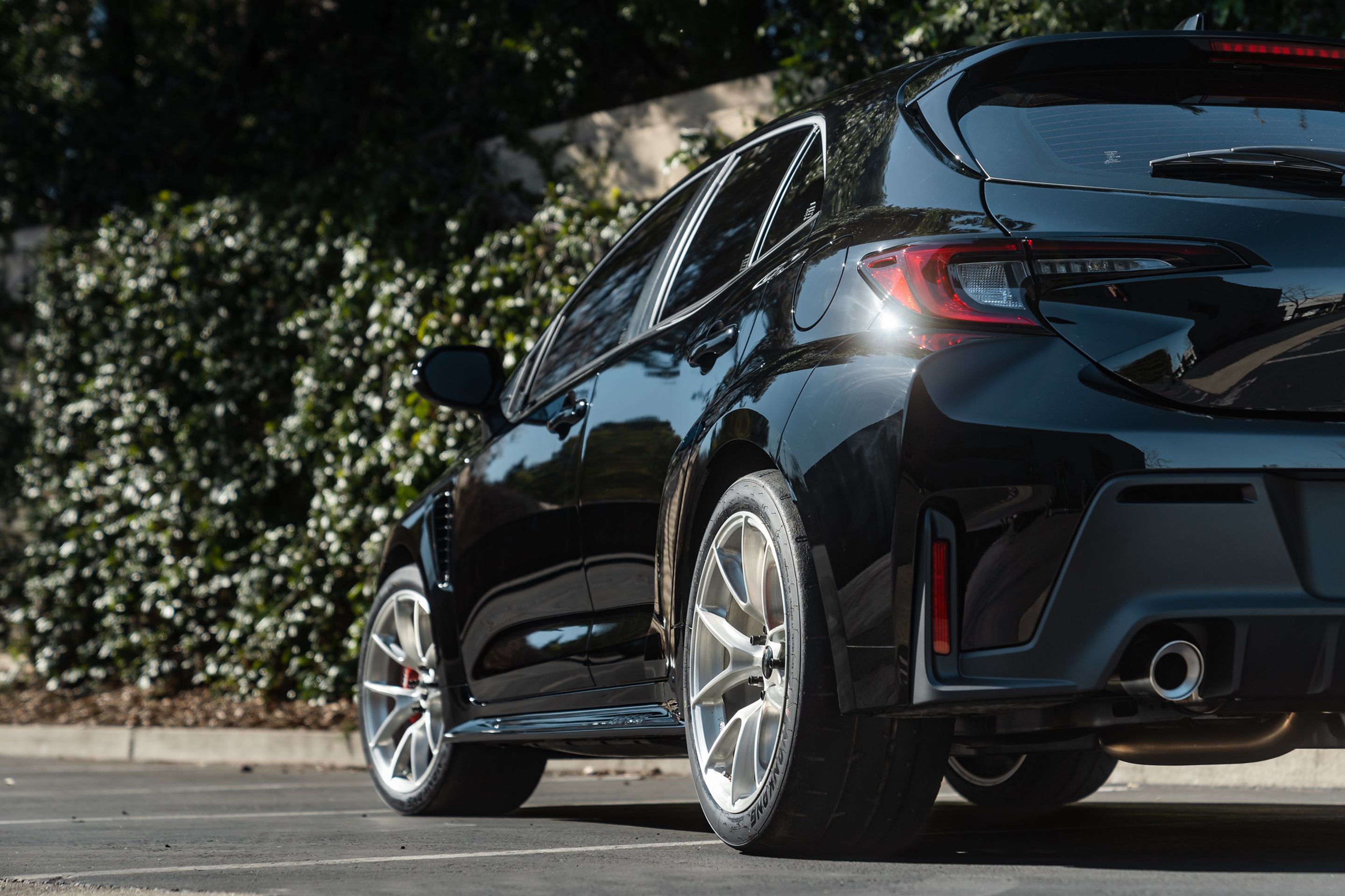 Black Toyota GR Corolla with 18" VS-5RS Apex wheels in Brushed Clear