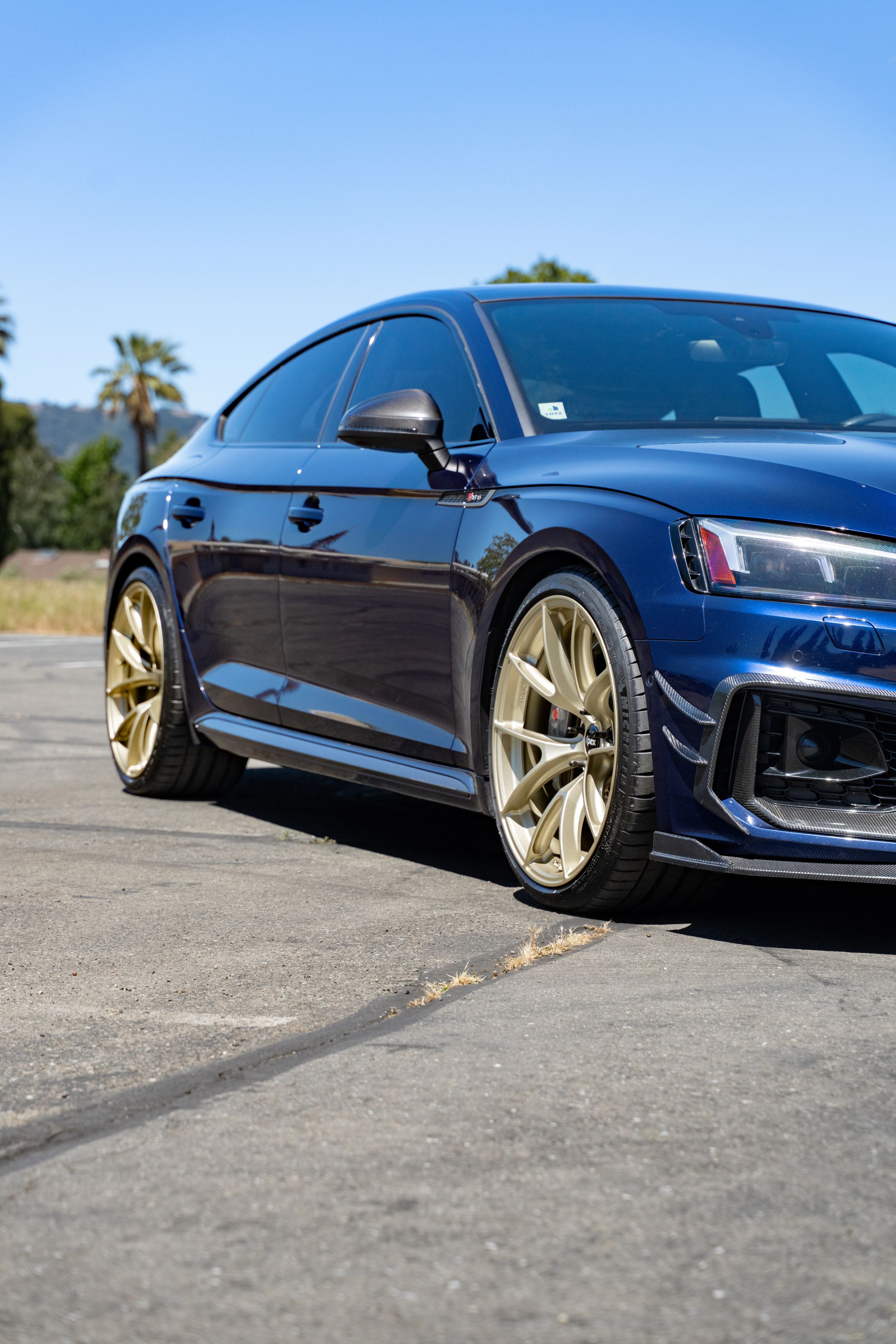 Blue Audi B9 RS 5 Sportback with 20" VS-5RS Apex wheels in Motorsport Gold