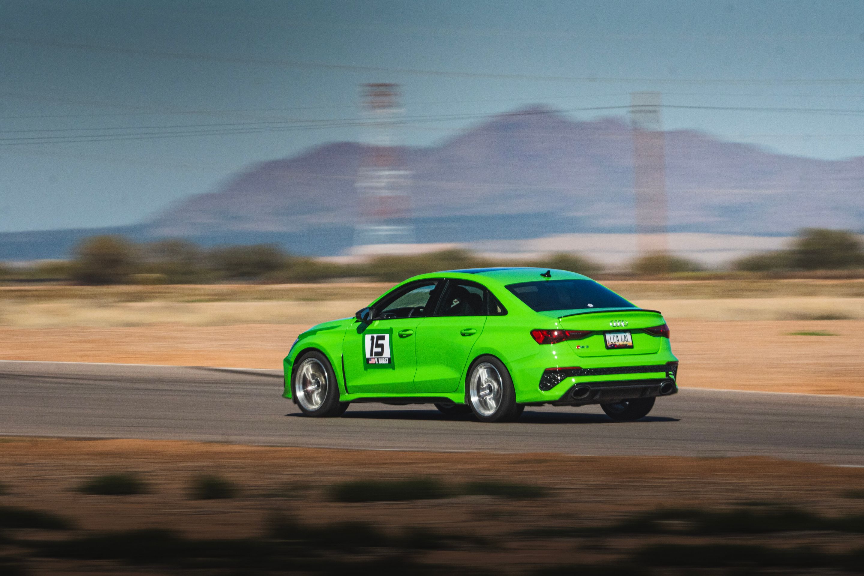 Green Audi 8Y RS 3 with 18" VS-5RS Apex wheels in Brushed Clear