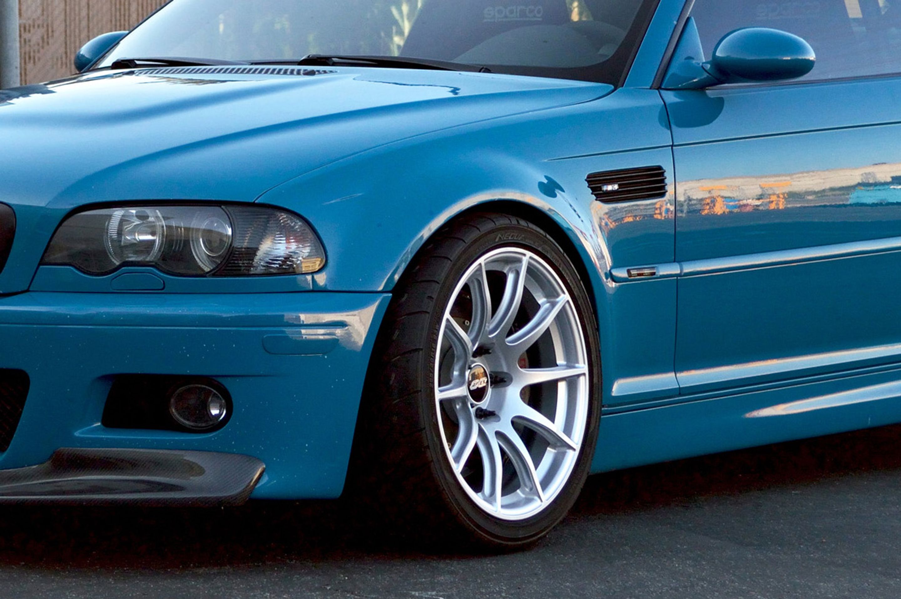 Blue BMW E46 M3 with 18" SM-10 Apex wheels in Race Silver