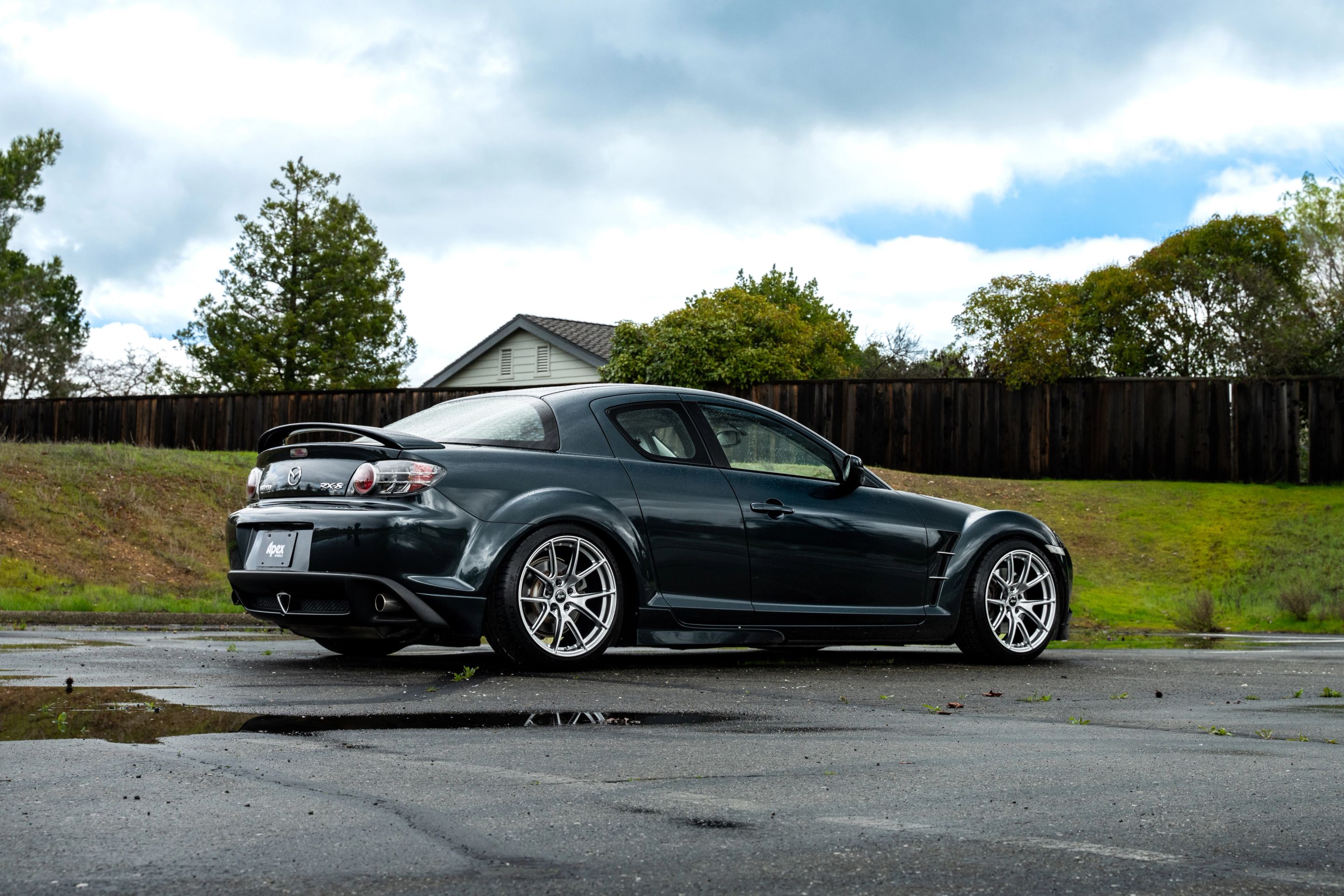 Green Mazda RX-8 with 18" VS-5 Apex wheels in Hyper Black